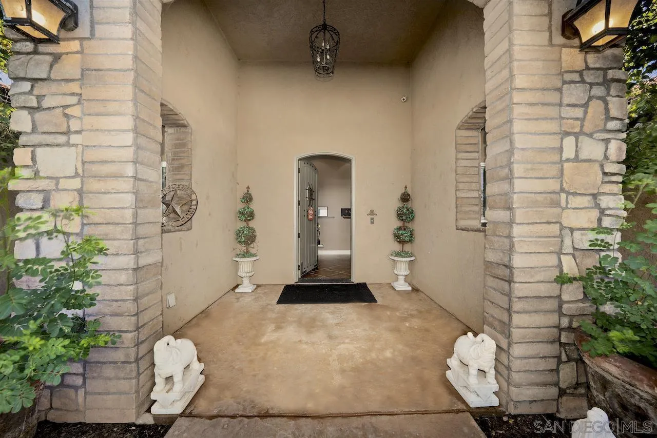 940 Heritage Ranch Road Ramona, CA 92065 - Photo 2 of 26 a view of a hallway with seating space