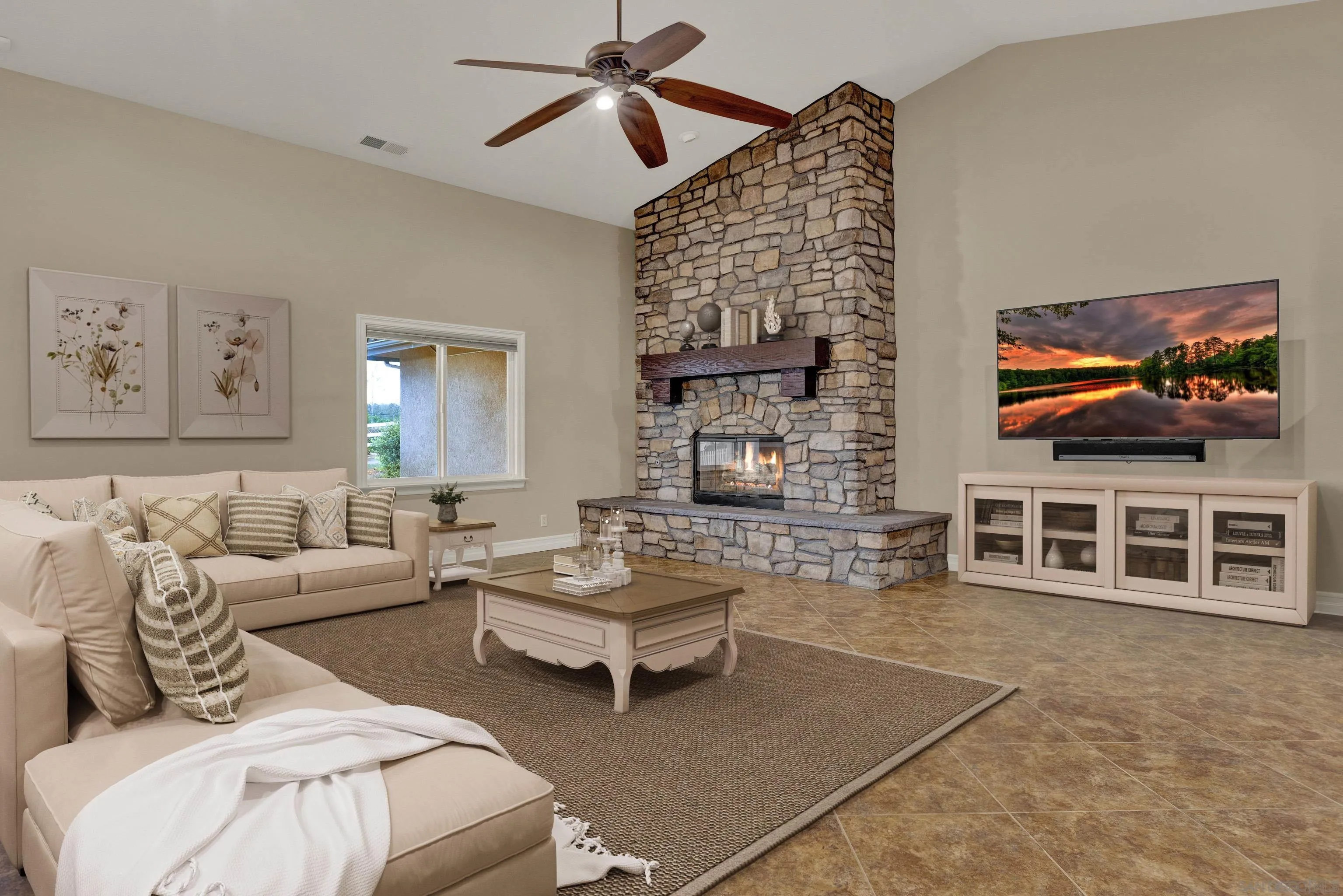 940 Heritage Ranch Road Ramona, CA 92065 - Photo 4 of 26 a spacious bedroom with a bed a couch and a flat screen tv