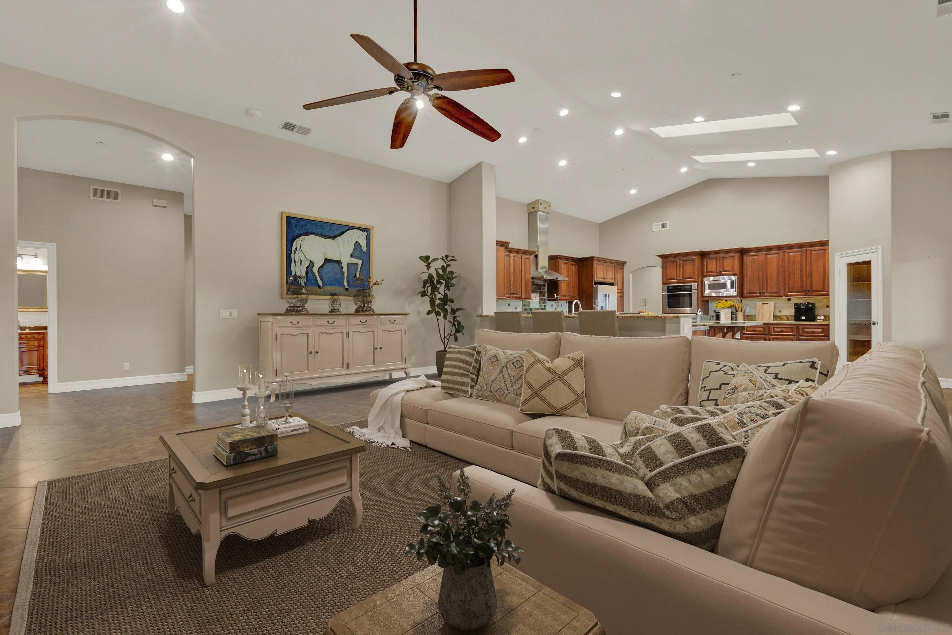 940 Heritage Ranch Road Ramona, CA 92065 - Photo 5 of 26 a living room with furniture and a chandelier