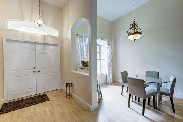 a view of a swimming pool with a yard