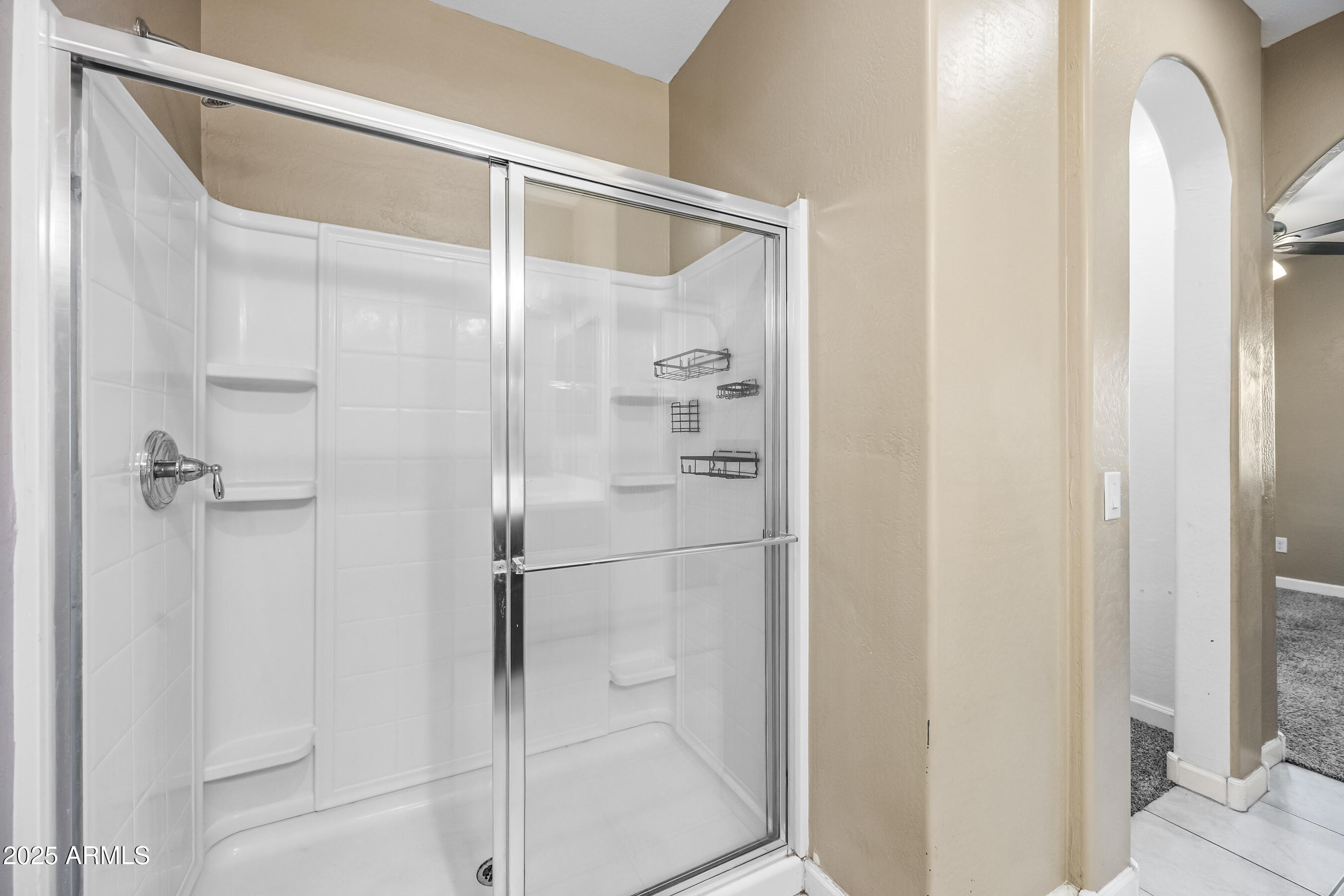 1367 South Country Club Drive, Unit 1131 Mesa, AZ 85210 - Photo 23 of 30 a bathroom with a glass shower door