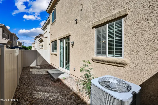 a house view with a backyard space