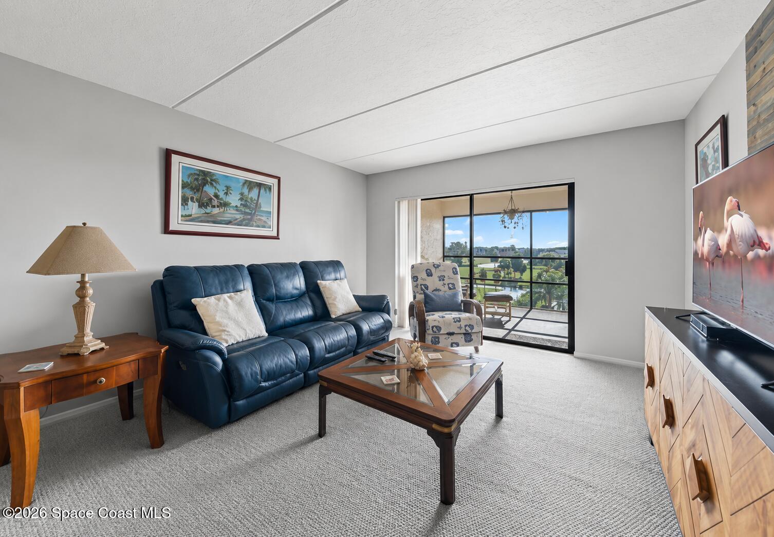 2775 North Wickham Road, Unit A403 Melbourne, FL 32935 - Photo 9 of 24 Family room