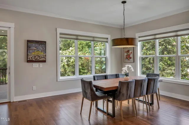 a bathroom with a bathtub and a window