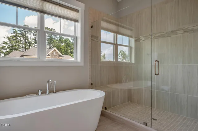 a bathroom with a sink mirror vanity and toilet