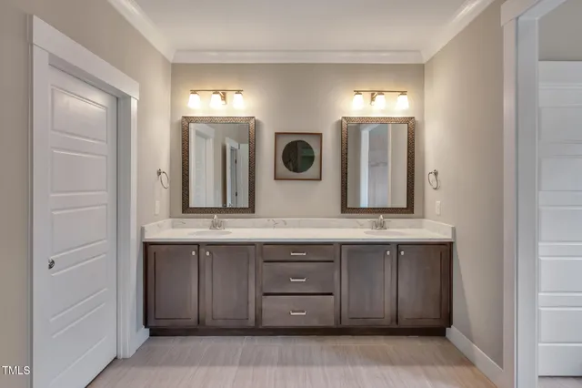 an aerial view of a house with a lake view