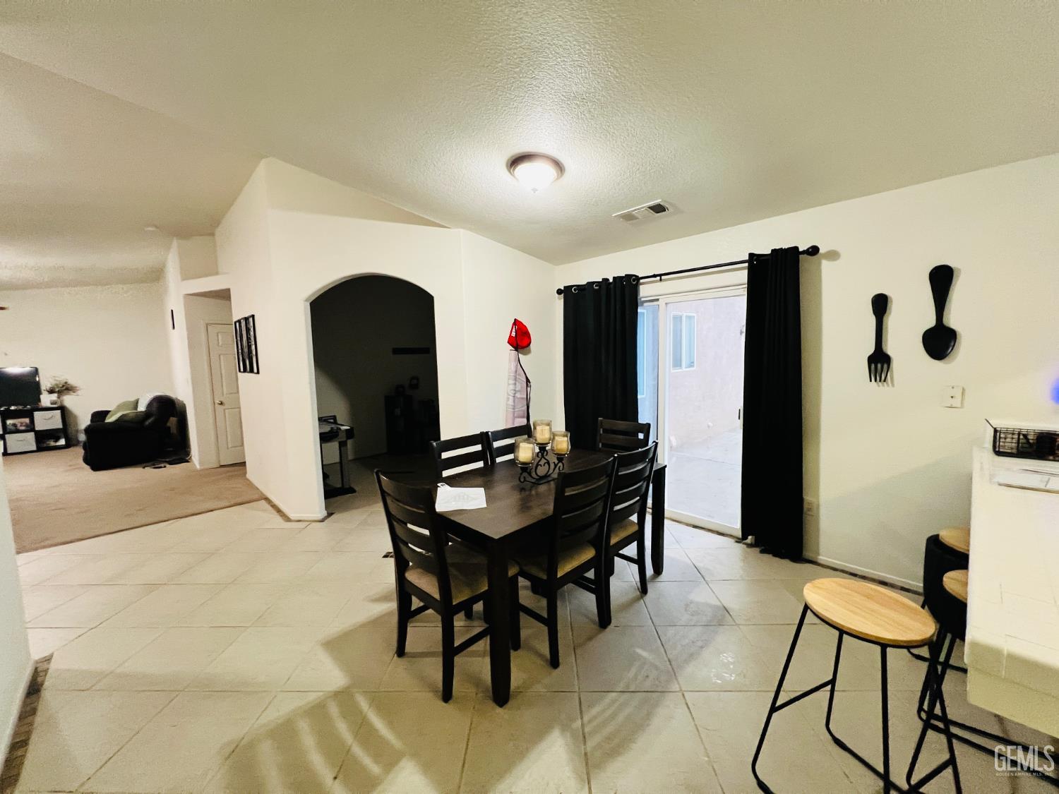 Undisclosed Address Wasco, CA 93280 - Photo 4 of 9 a living room with furniture and a large window
