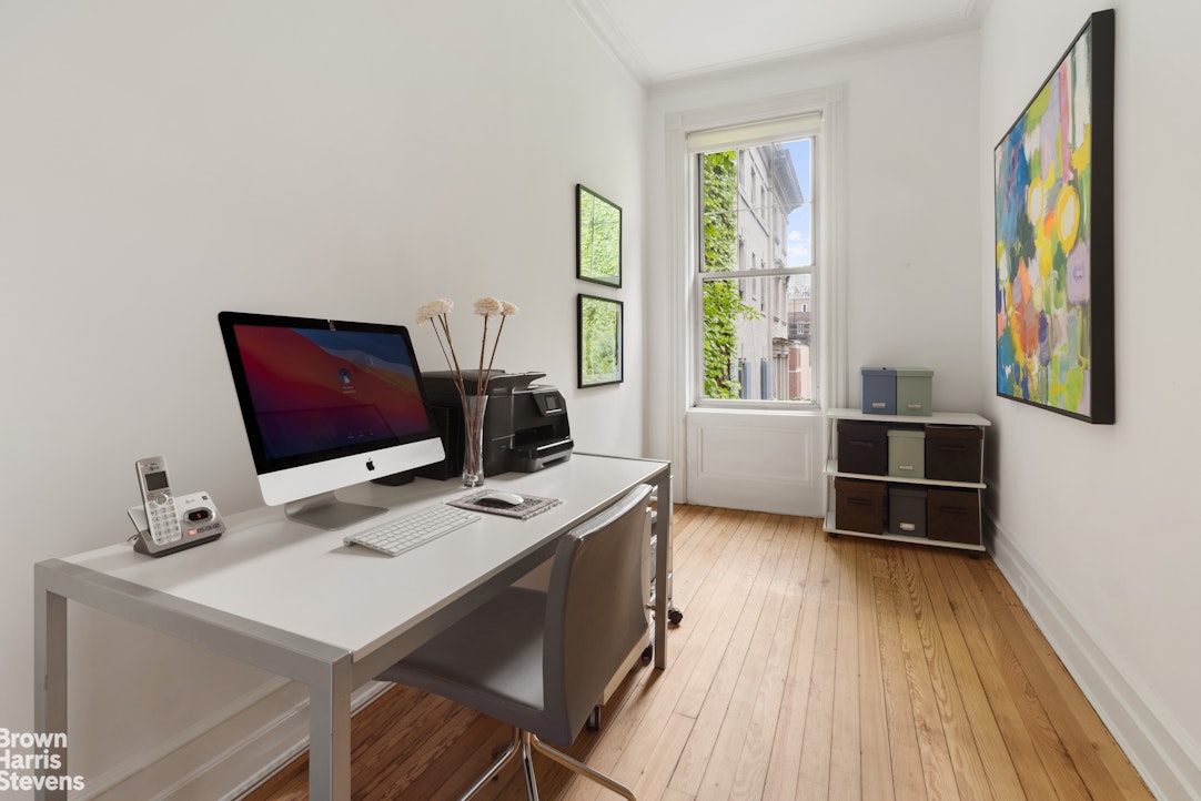 14 East 92nd Street, Unit 4 Manhattan, NY 10128 - Photo 6 of 8 a workspace with furniture and window