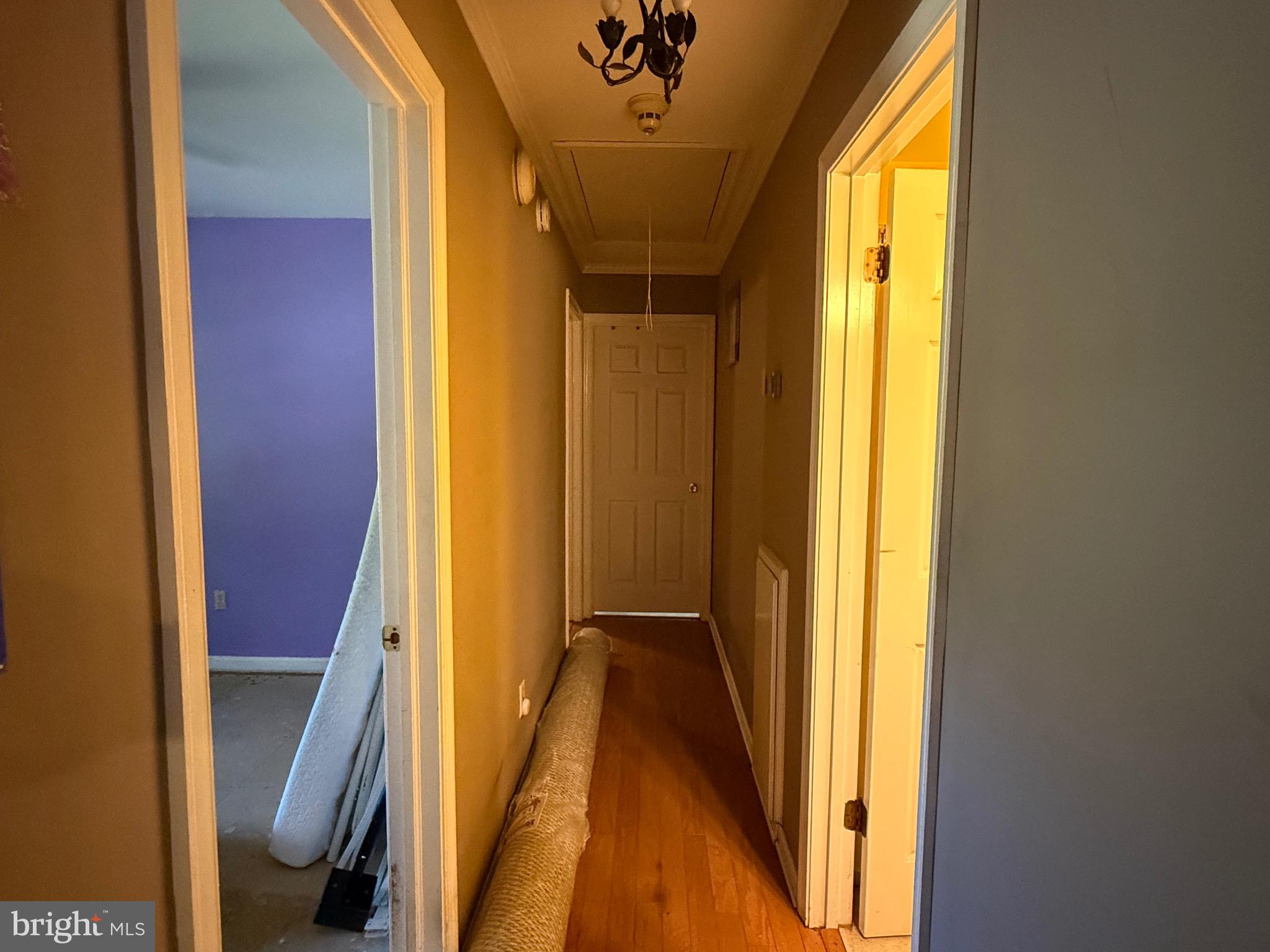 1214 Johnson Road Salisbury, MD 21804 - Photo 27 of 59 a view of a hallway with wooden floor and a livingroom