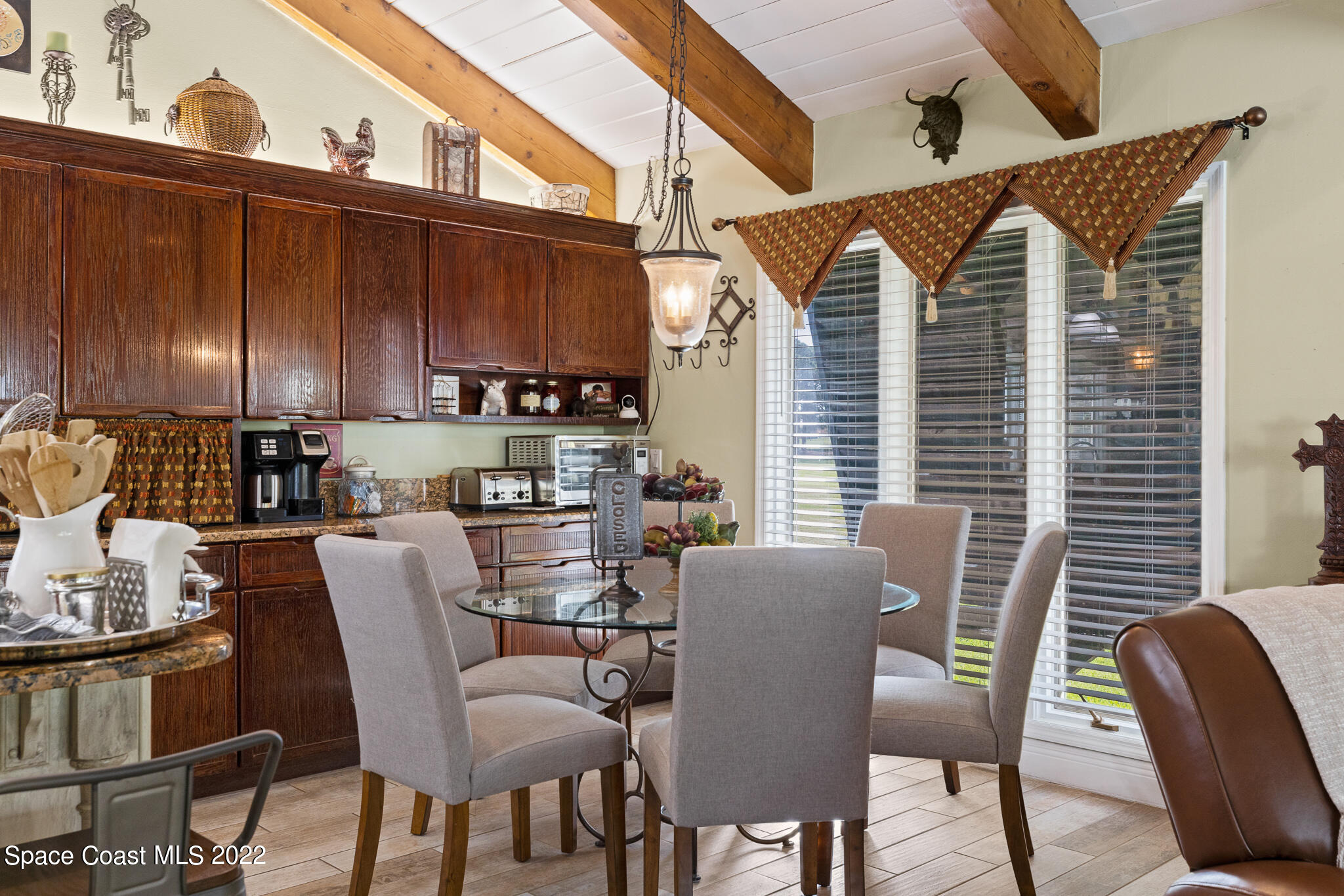 810 Kerry Downs Circle Melbourne, FL 32940 - Photo 20 of 59 a view of a dining room with furniture