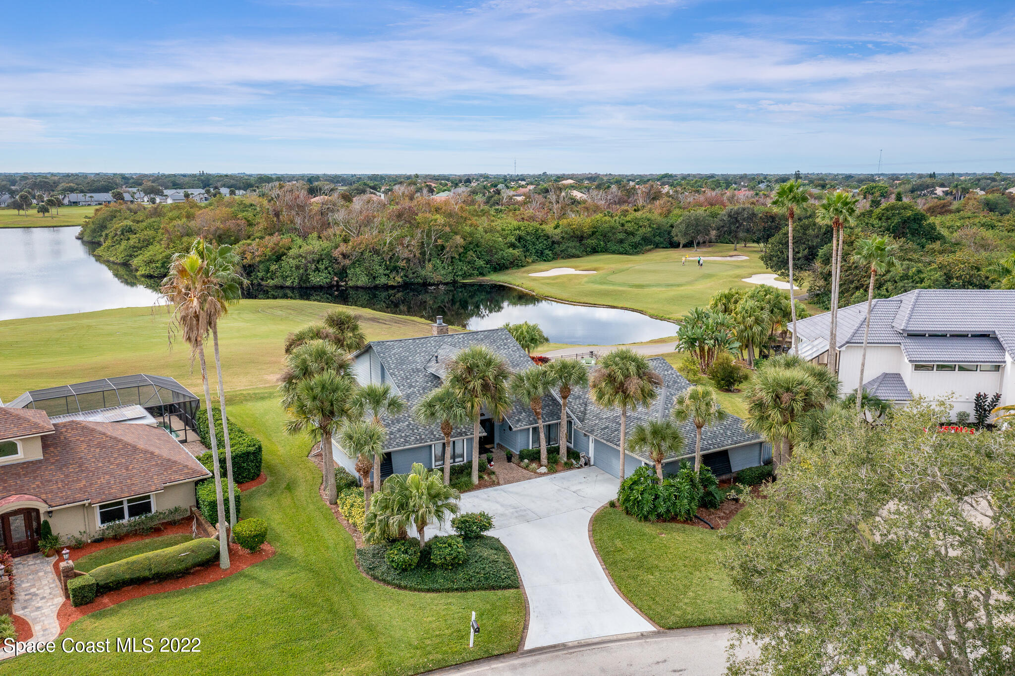 810 Kerry Downs Circle Melbourne, FL 32940 - Photo 2 of 59 an aerial view of a house with a garden