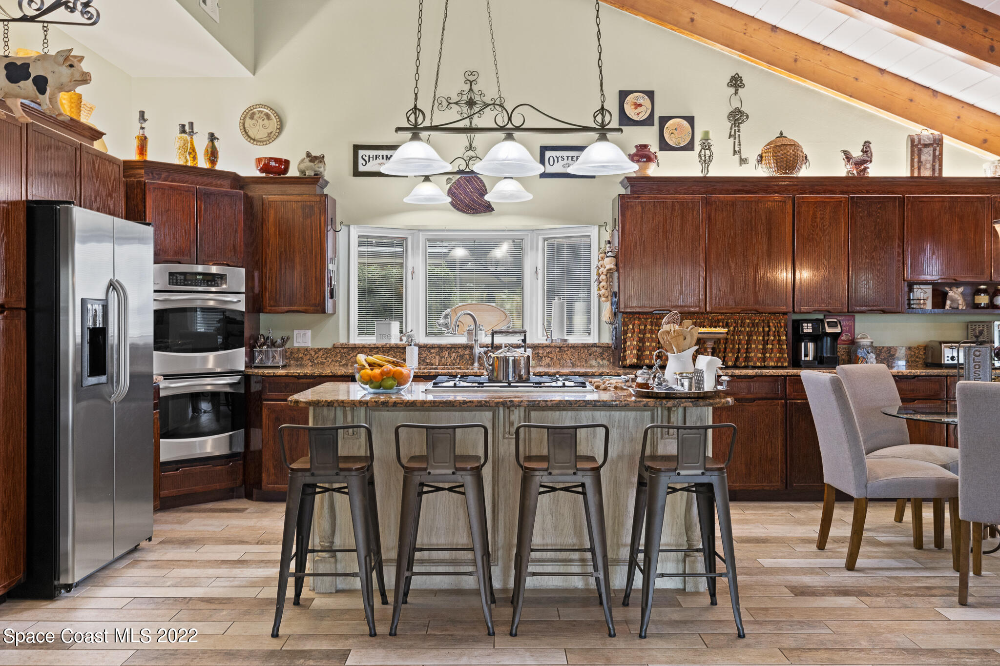 810 Kerry Downs Circle Melbourne, FL 32940 - Photo 24 of 59 a kitchen with lots of counter space and appliances