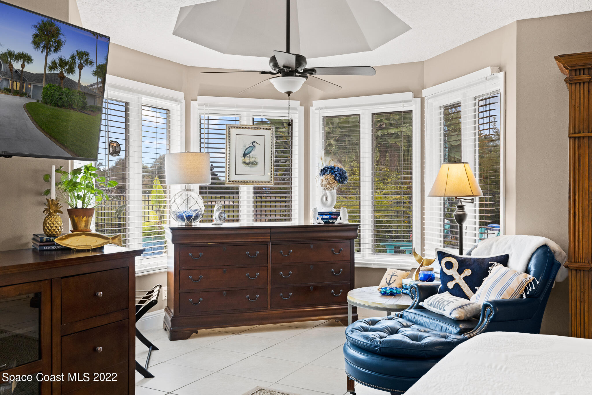 810 Kerry Downs Circle Melbourne, FL 32940 - Photo 31 of 59 a living room with furniture and a window