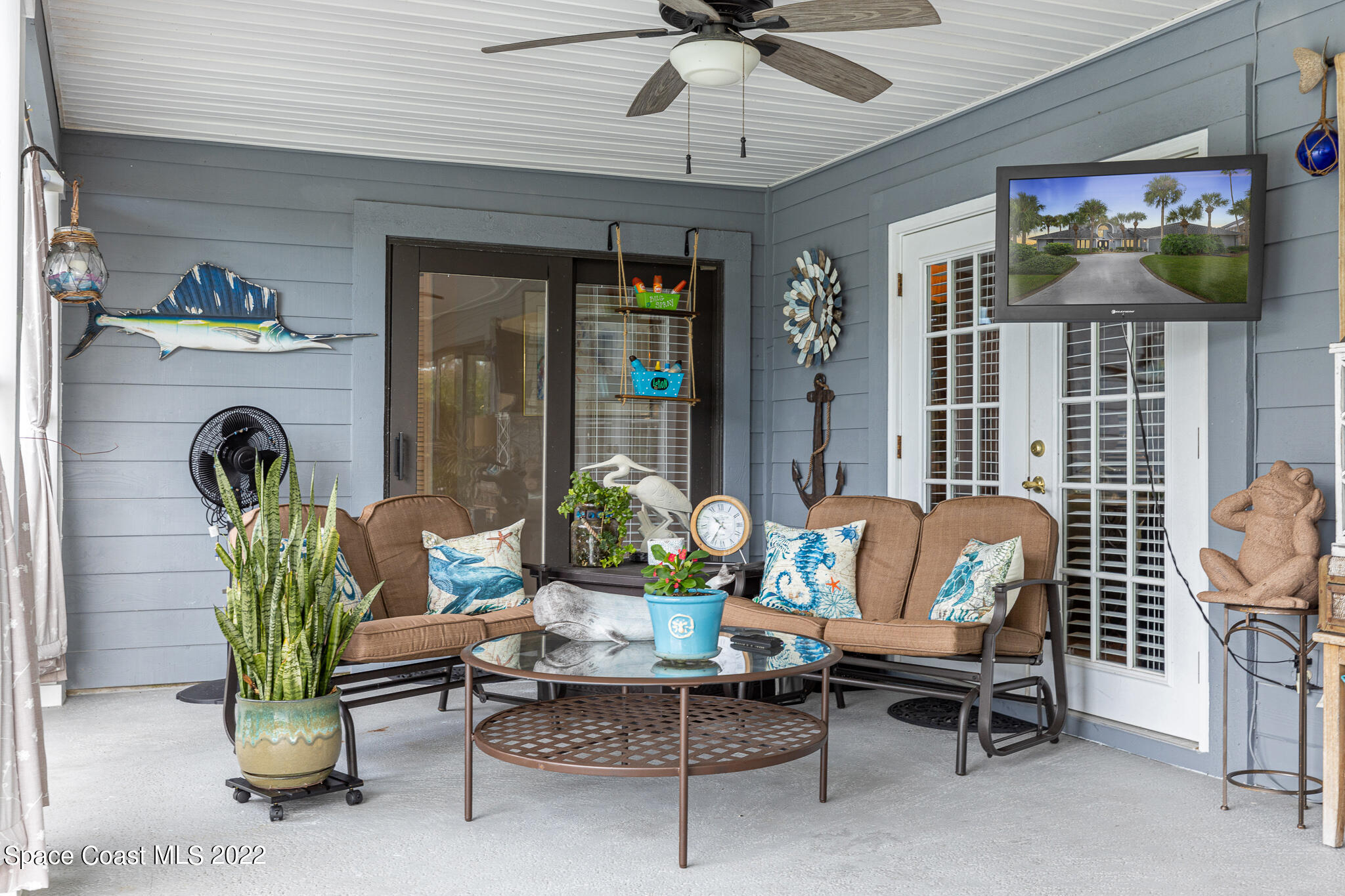 810 Kerry Downs Circle Melbourne, FL 32940 - Photo 43 of 59 a living room with furniture and a window