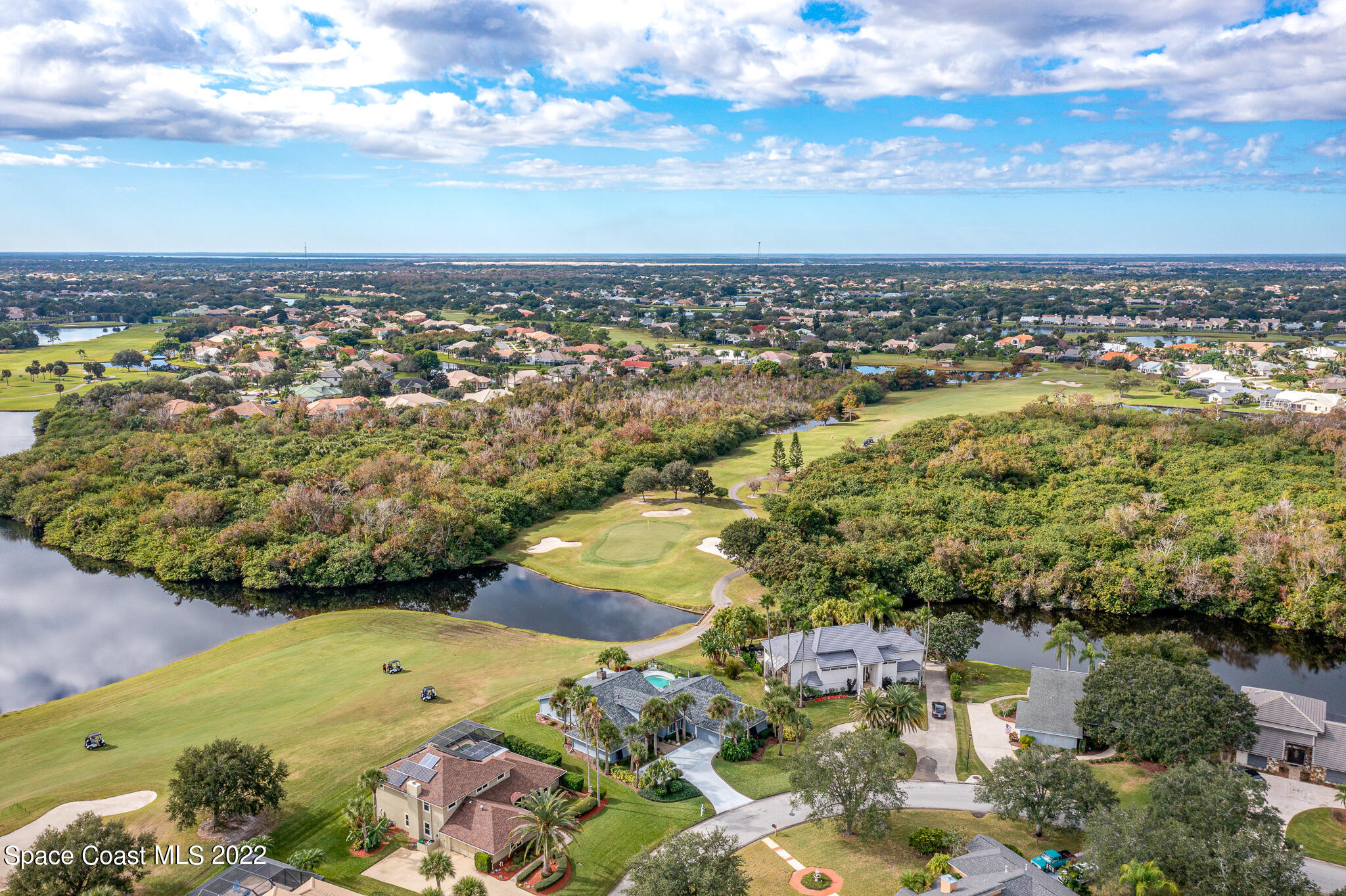 810 Kerry Downs Circle Melbourne, FL 32940 - Photo 53 of 59 a view of a city with an ocean