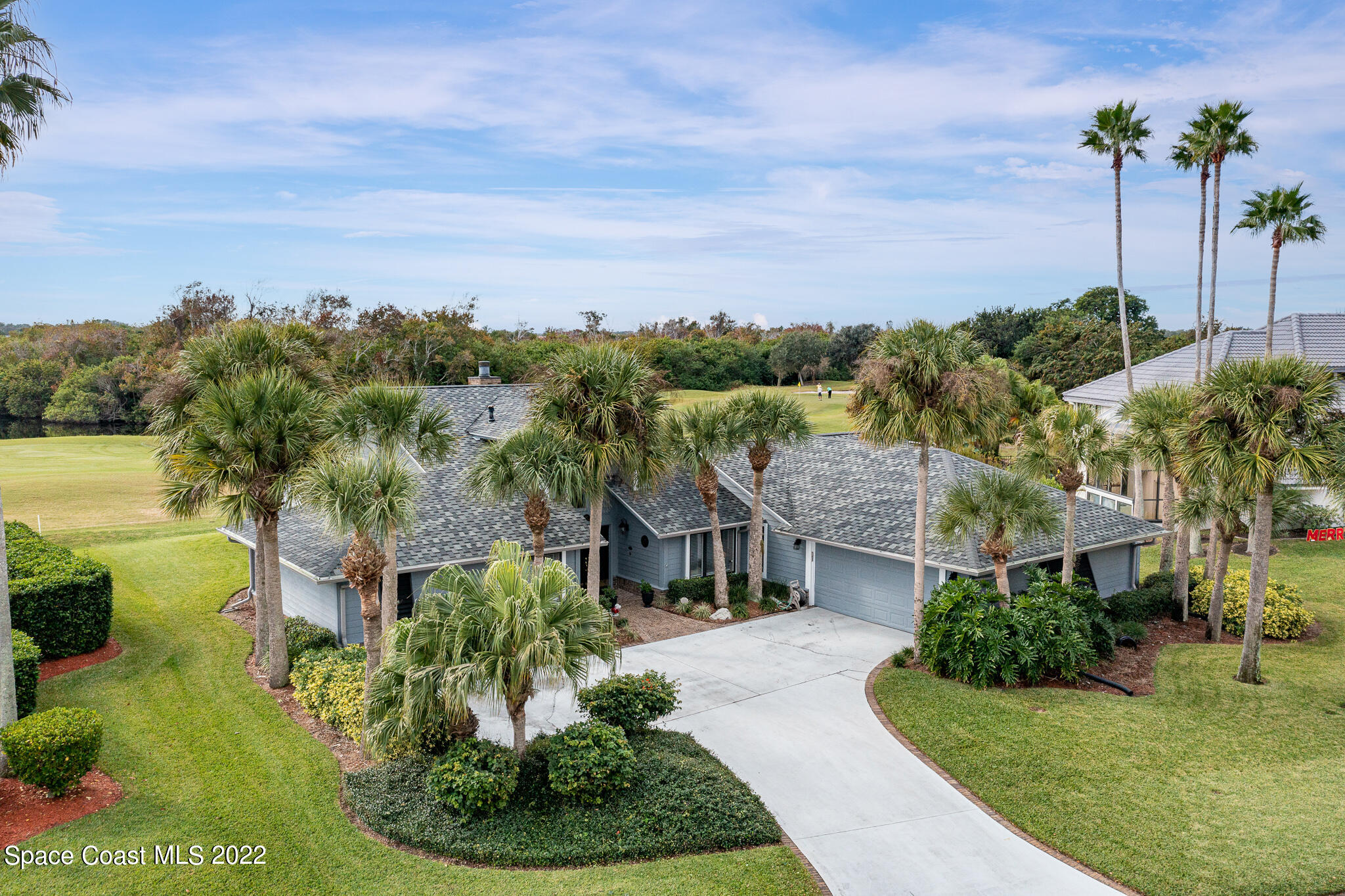810 Kerry Downs Circle Melbourne, FL 32940 - Photo 56 of 59 a aerial view of a house with a yard and potted plants