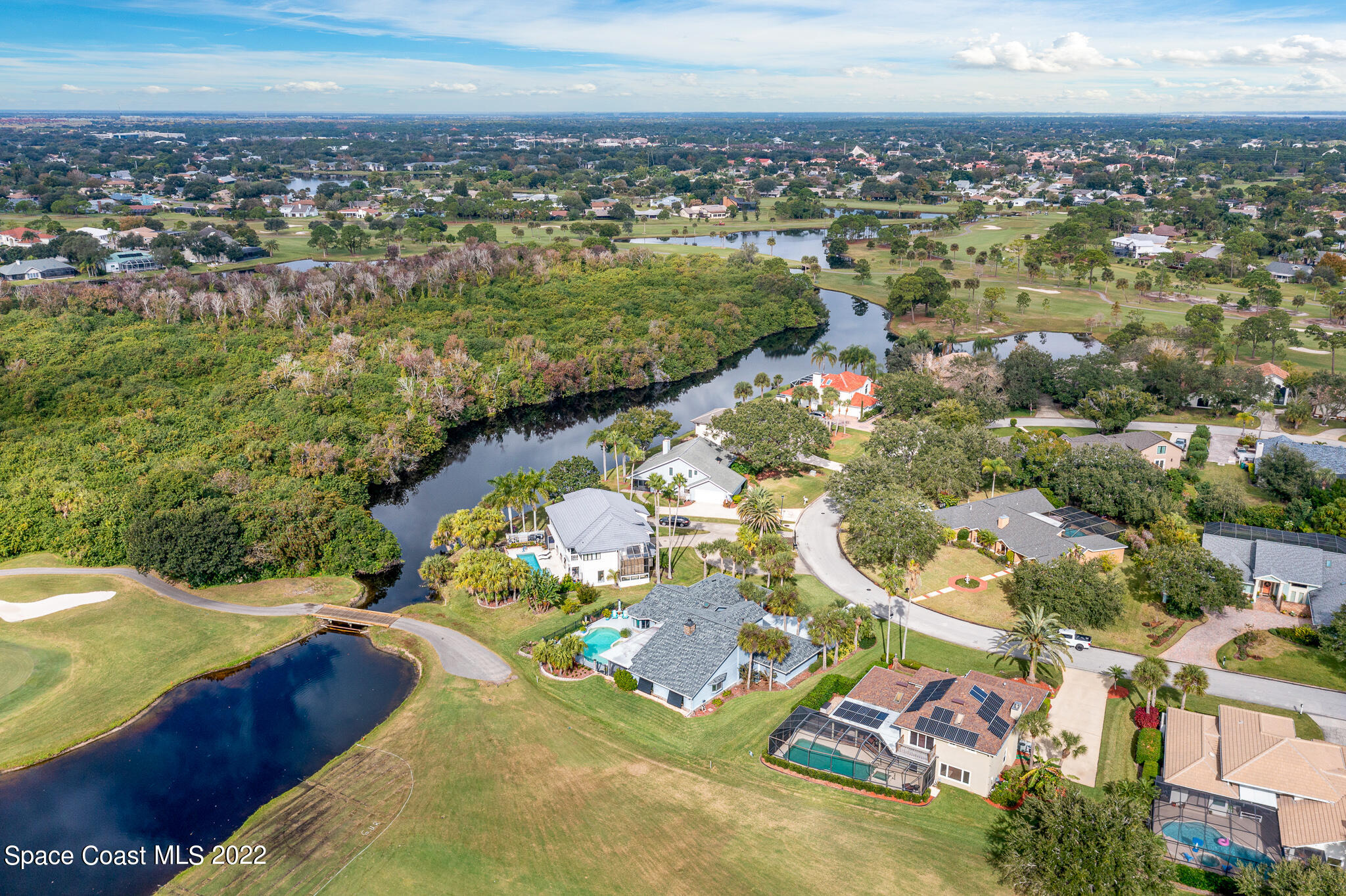 810 Kerry Downs Circle Melbourne, FL 32940 - Photo 58 of 59 an aerial view of a city