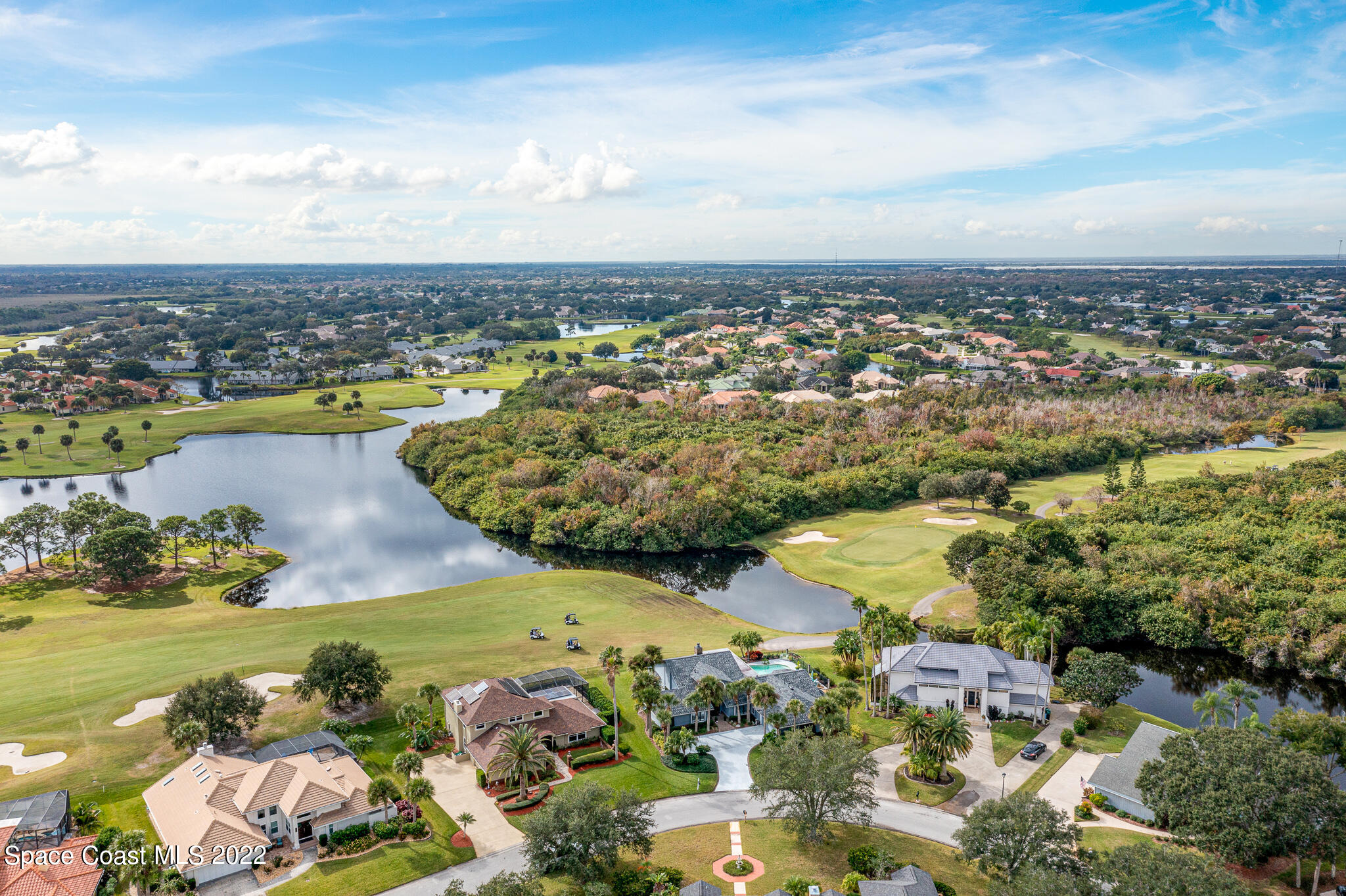 810 Kerry Downs Circle Melbourne, FL 32940 - Photo 59 of 59 a view of a city with an ocean