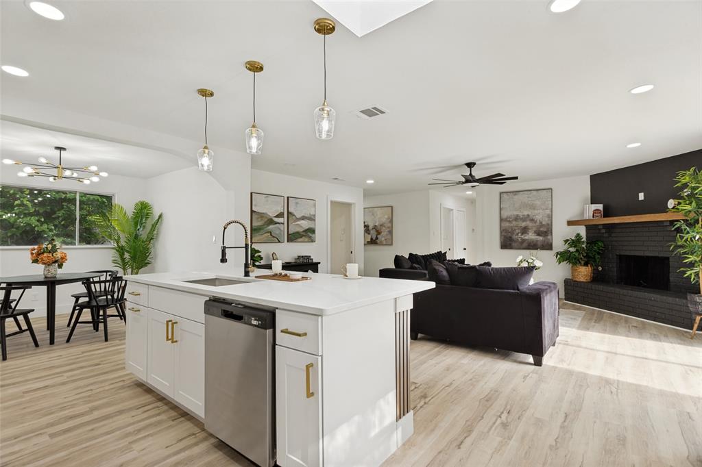3816 Springbranch Drive Benbrook, TX 76116 - Photo 7 of 25 a view of kitchen with sink and living room