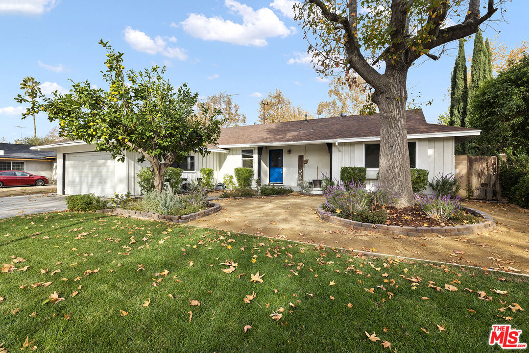 4161 Deborah Street Simi Valley, CA 93063 - Photo 1 of 14 a front view of a house with a yard