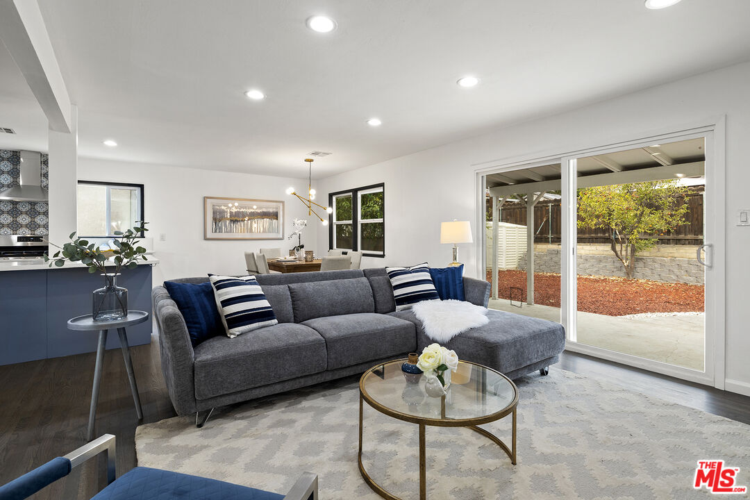 4161 Deborah Street Simi Valley, CA 93063 - Photo 5 of 14 a living room with furniture and a large window