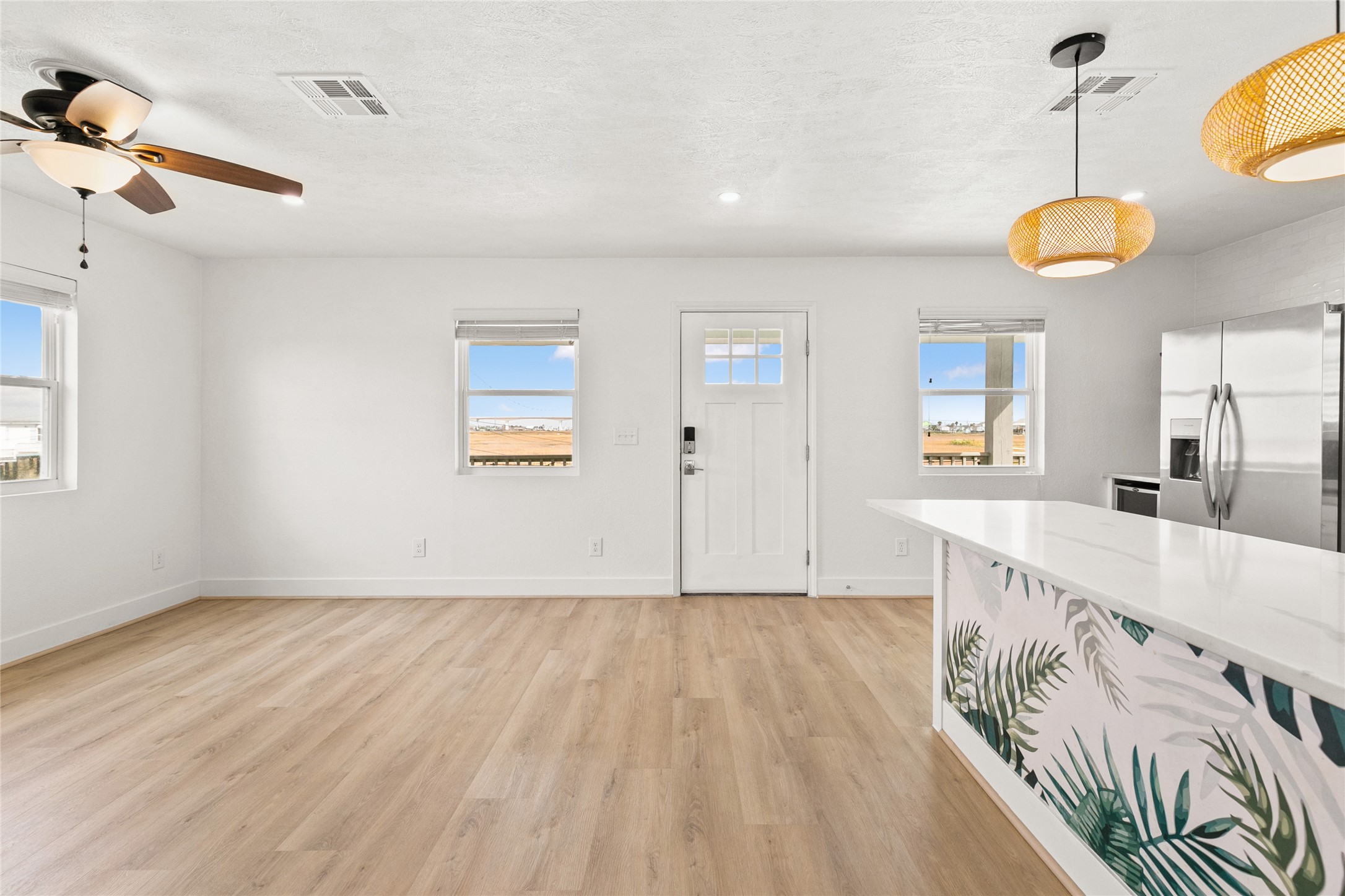 715 Caisson Street Surfside Beach, TX 77541 - Photo 11 of 35 a view of a kitchen with a sink and cabinets
