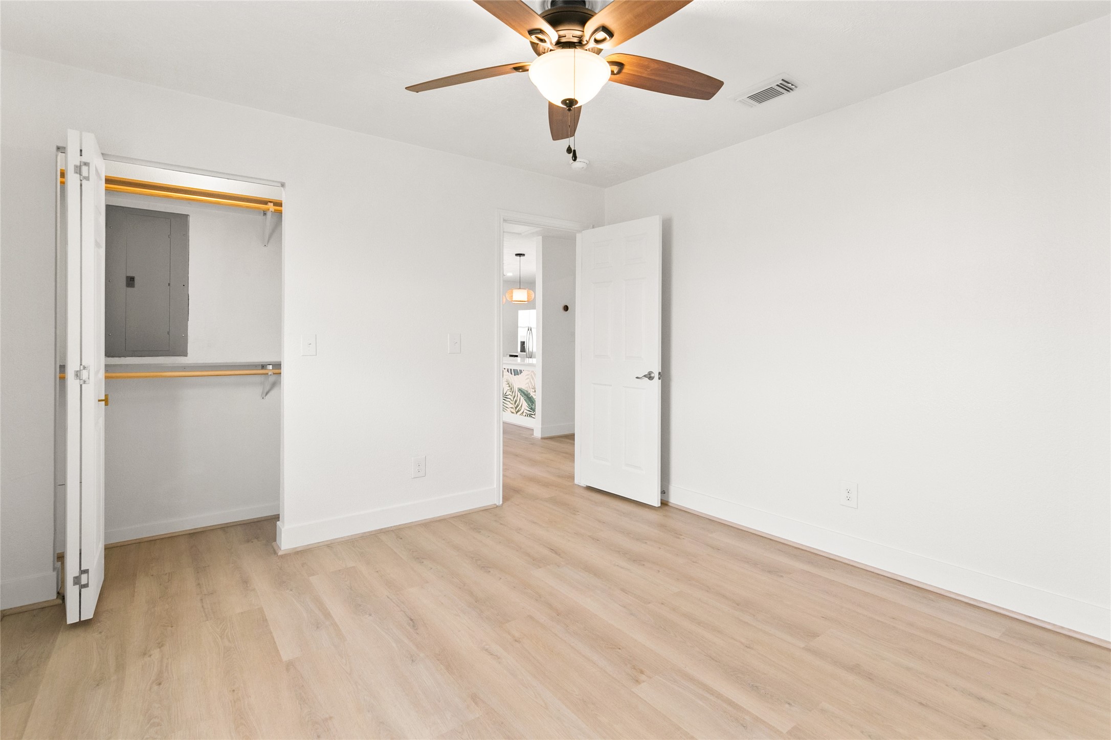 715 Caisson Street Surfside Beach, TX 77541 - Photo 23 of 35 wooden floor in an empty room