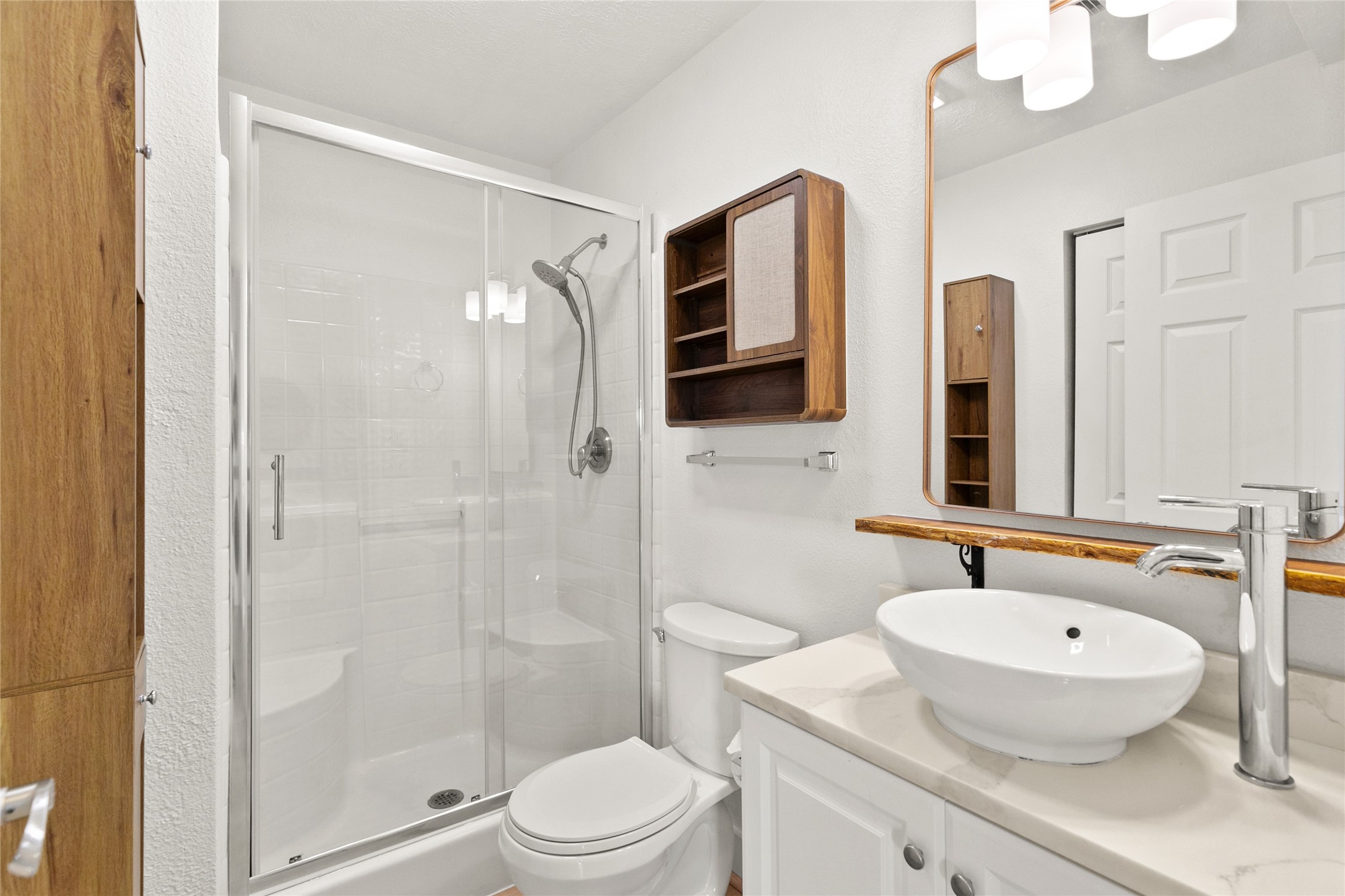 715 Caisson Street Surfside Beach, TX 77541 - Photo 25 of 35 a bathroom with a sink a toilet and shower