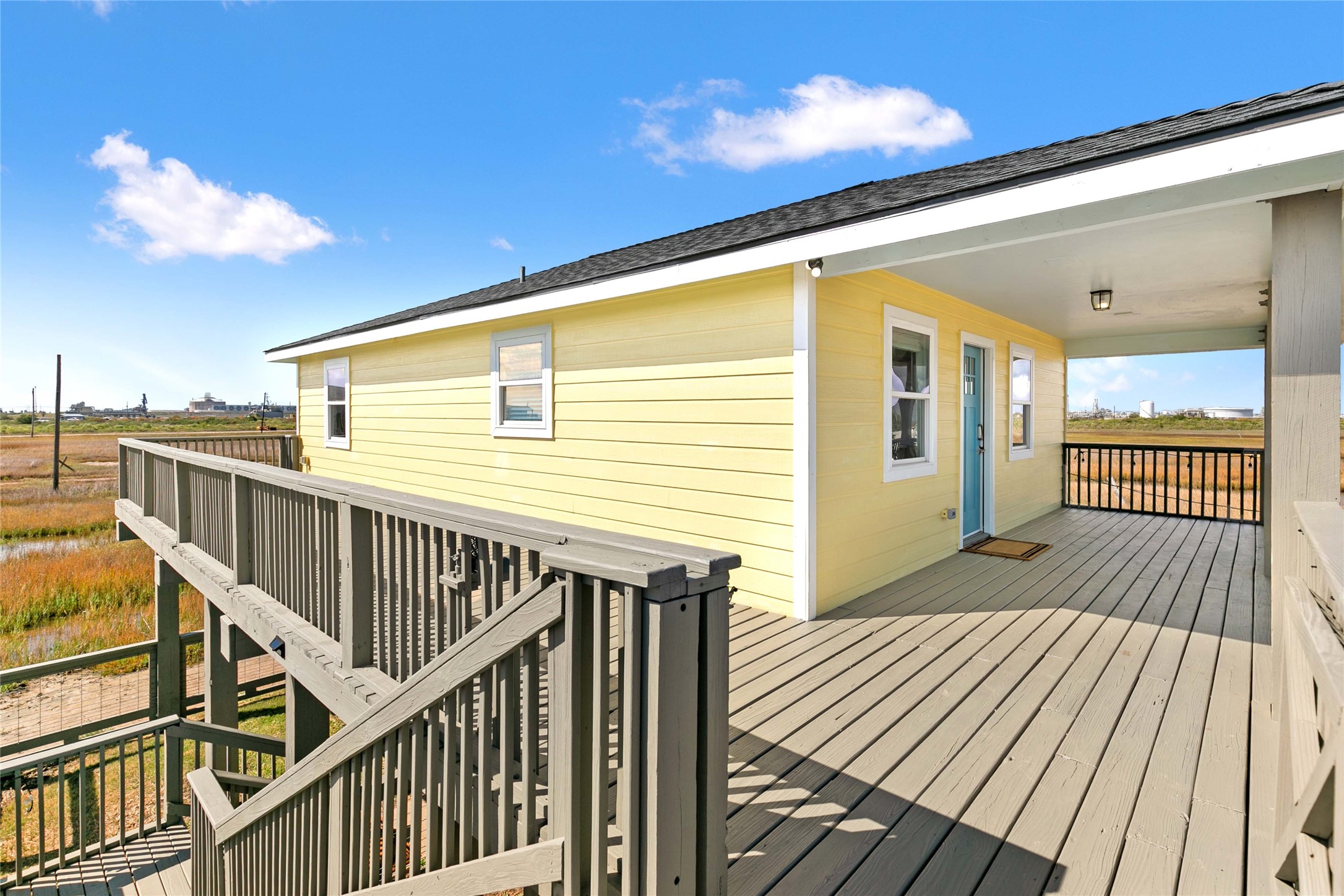 715 Caisson Street Surfside Beach, TX 77541 - Photo 7 of 35 a view of a balcony with wooden floor