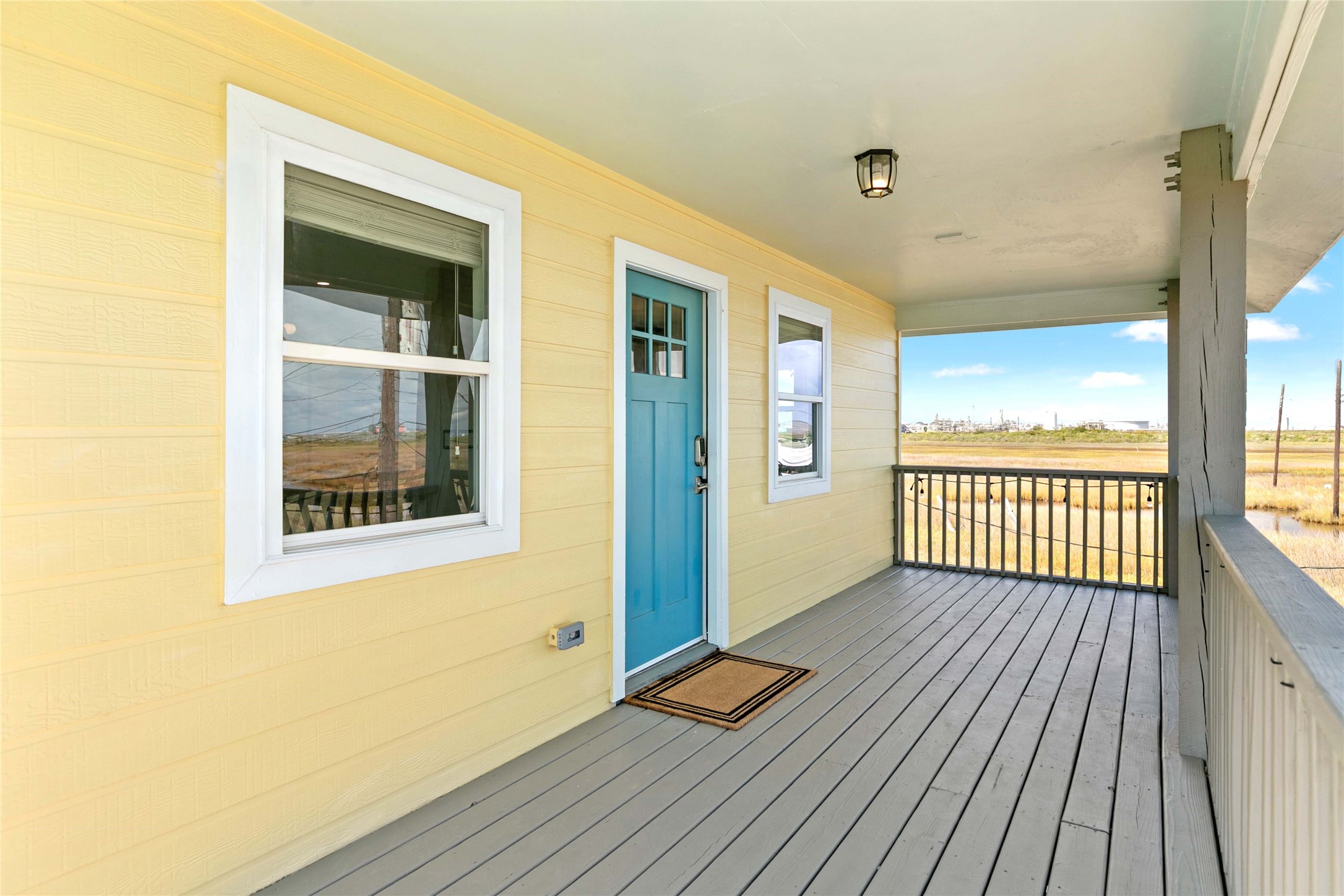 715 Caisson Street Surfside Beach, TX 77541 - Photo 10 of 35 a view of a balcony with wooden floor