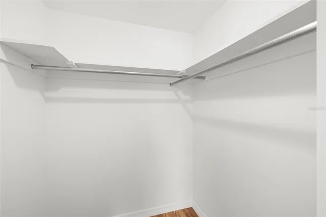 a view of an empty walk in closet