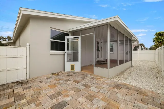 a view of backyard of the house