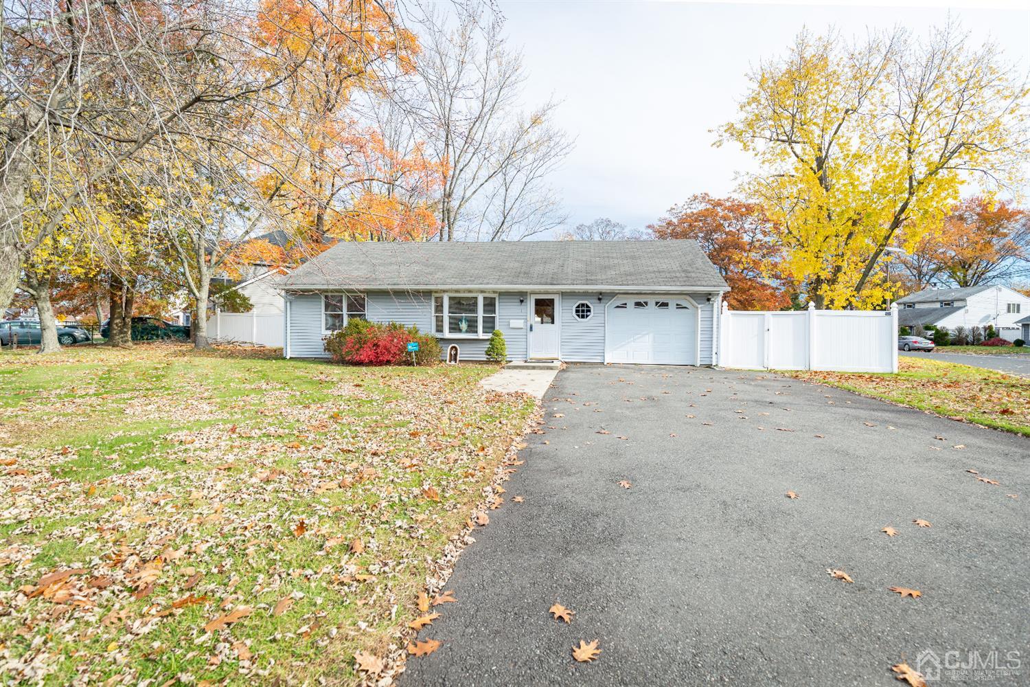 1 Crescent Road Edison, NJ 08817 - Photo 2 of 36 a front view of a house with a yard