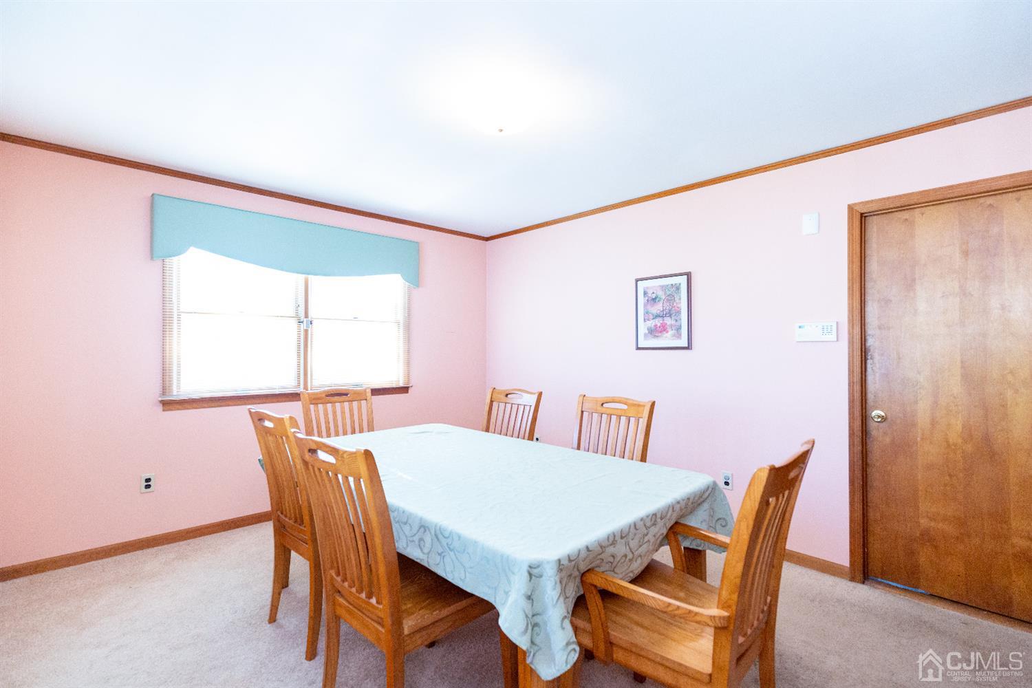 1 Crescent Road Edison, NJ 08817 - Photo 12 of 36 a view of a dining room with furniture