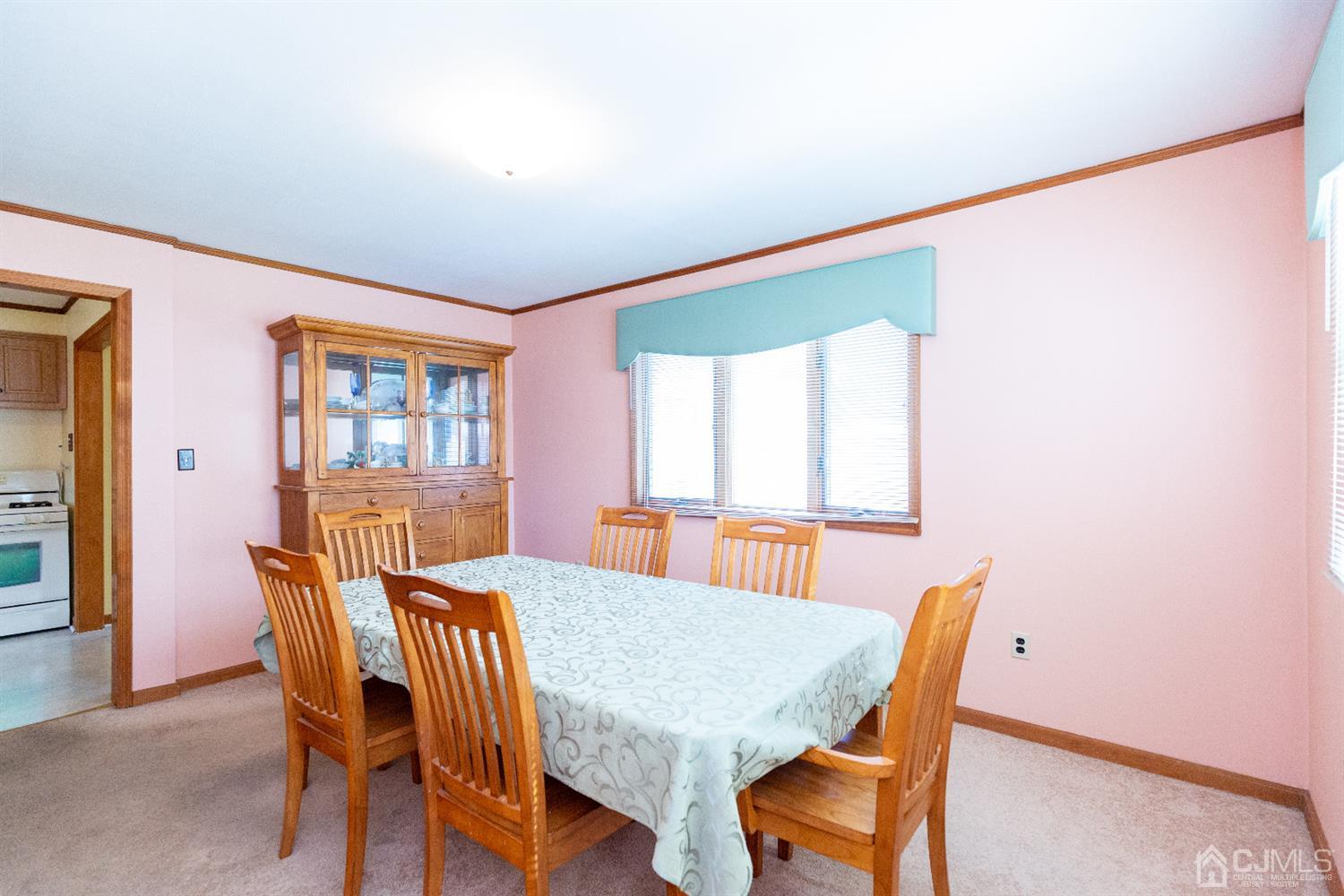 1 Crescent Road Edison, NJ 08817 - Photo 14 of 36 a view of a dining room with furniture and window