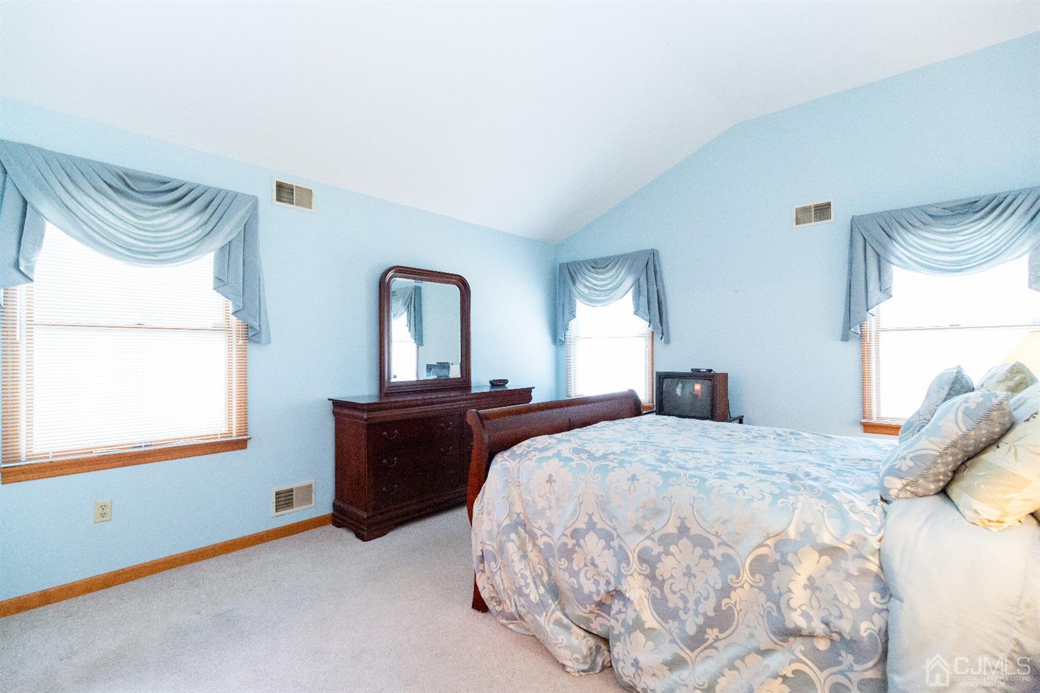 1 Crescent Road Edison, NJ 08817 - Photo 20 of 36 a bedroom with a bed and window