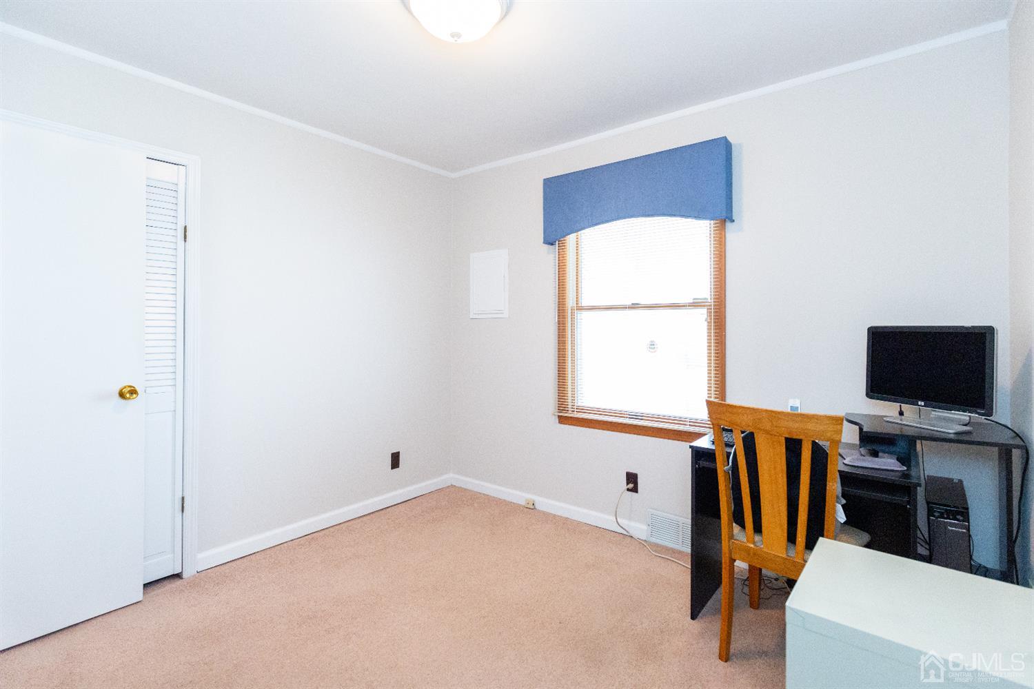 1 Crescent Road Edison, NJ 08817 - Photo 27 of 36 a view of a room with gym equipment