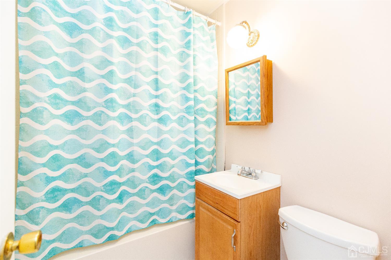 1 Crescent Road Edison, NJ 08817 - Photo 28 of 36 a bathroom with a sink and a toilet