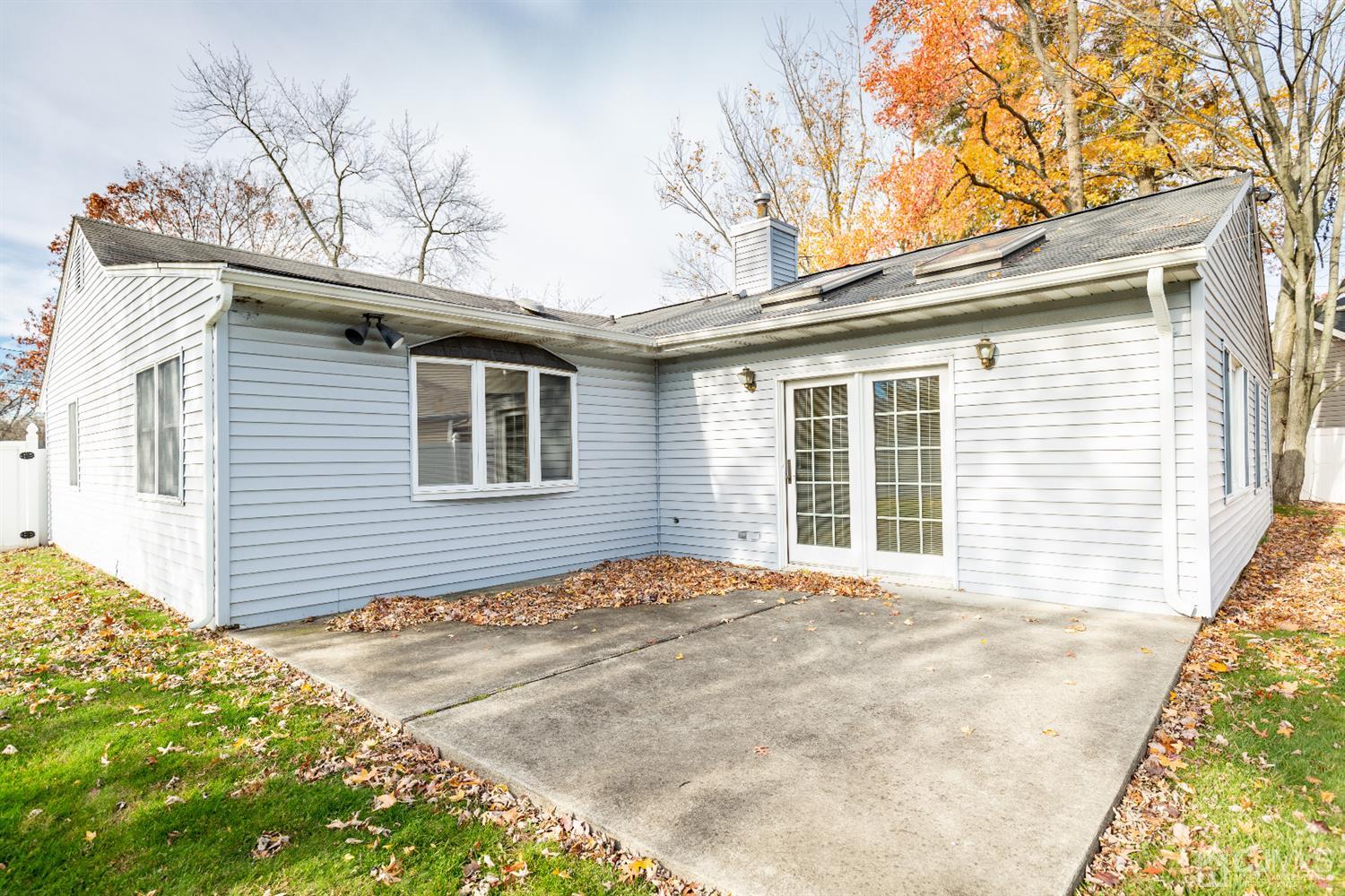 1 Crescent Road Edison, NJ 08817 - Photo 29 of 36 a front view of a house with a big yard and garage