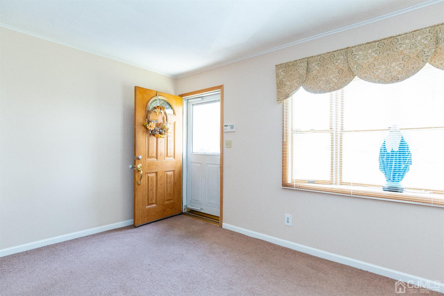 1 Crescent Road Edison, NJ 08817 - Photo 4 of 36 an empty room with a window