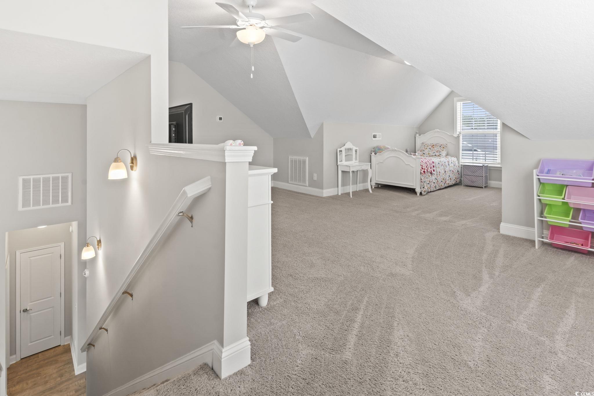 712 Hobonny Loop Longs, SC 29568 - Photo 29 of 39 Carpeted bedroom featuring baseboards, visible vents, and vaulted ceiling