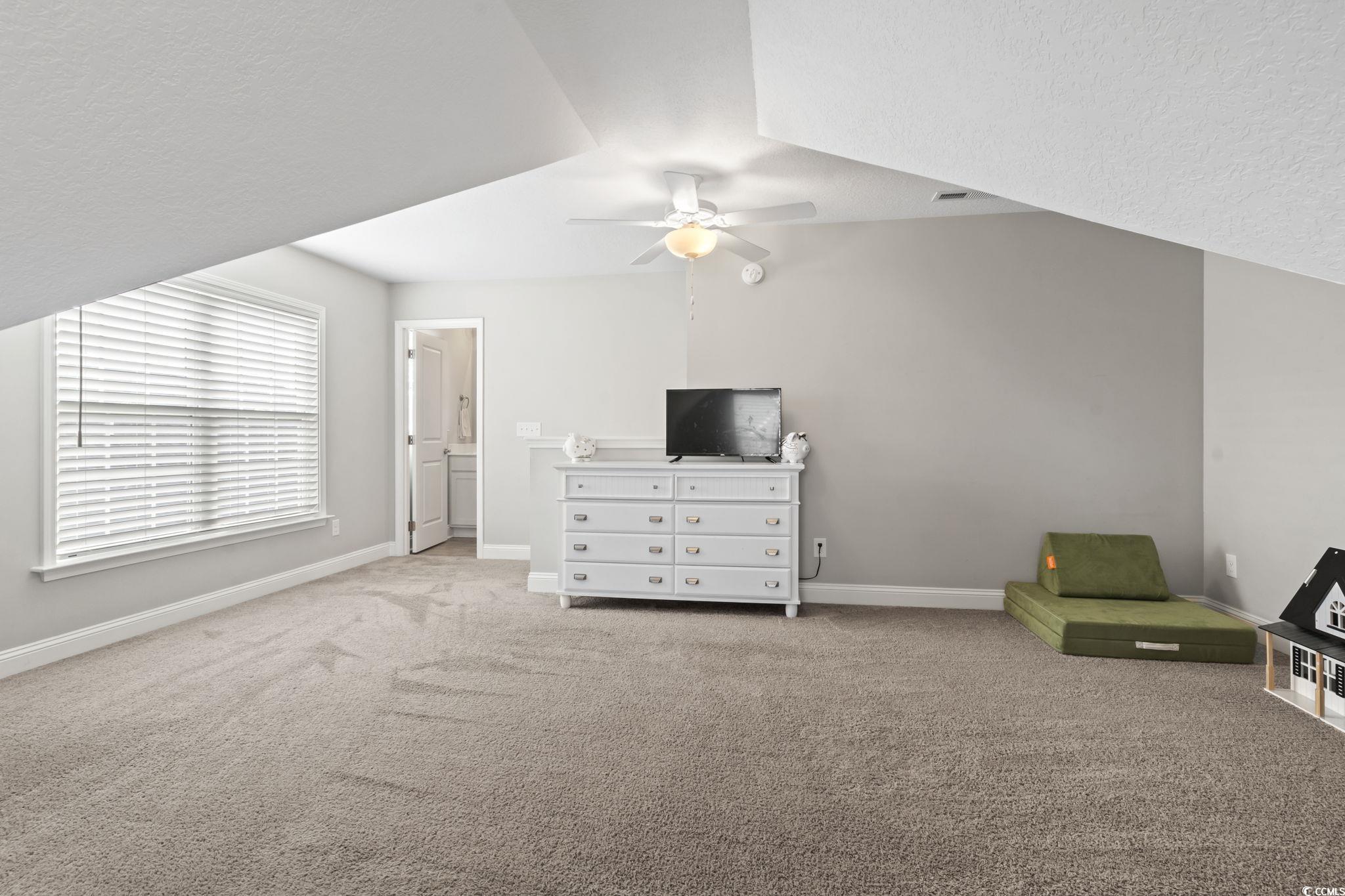 712 Hobonny Loop Longs, SC 29568 - Photo 32 of 39 Carpeted bedroom featuring baseboards and ceiling fan