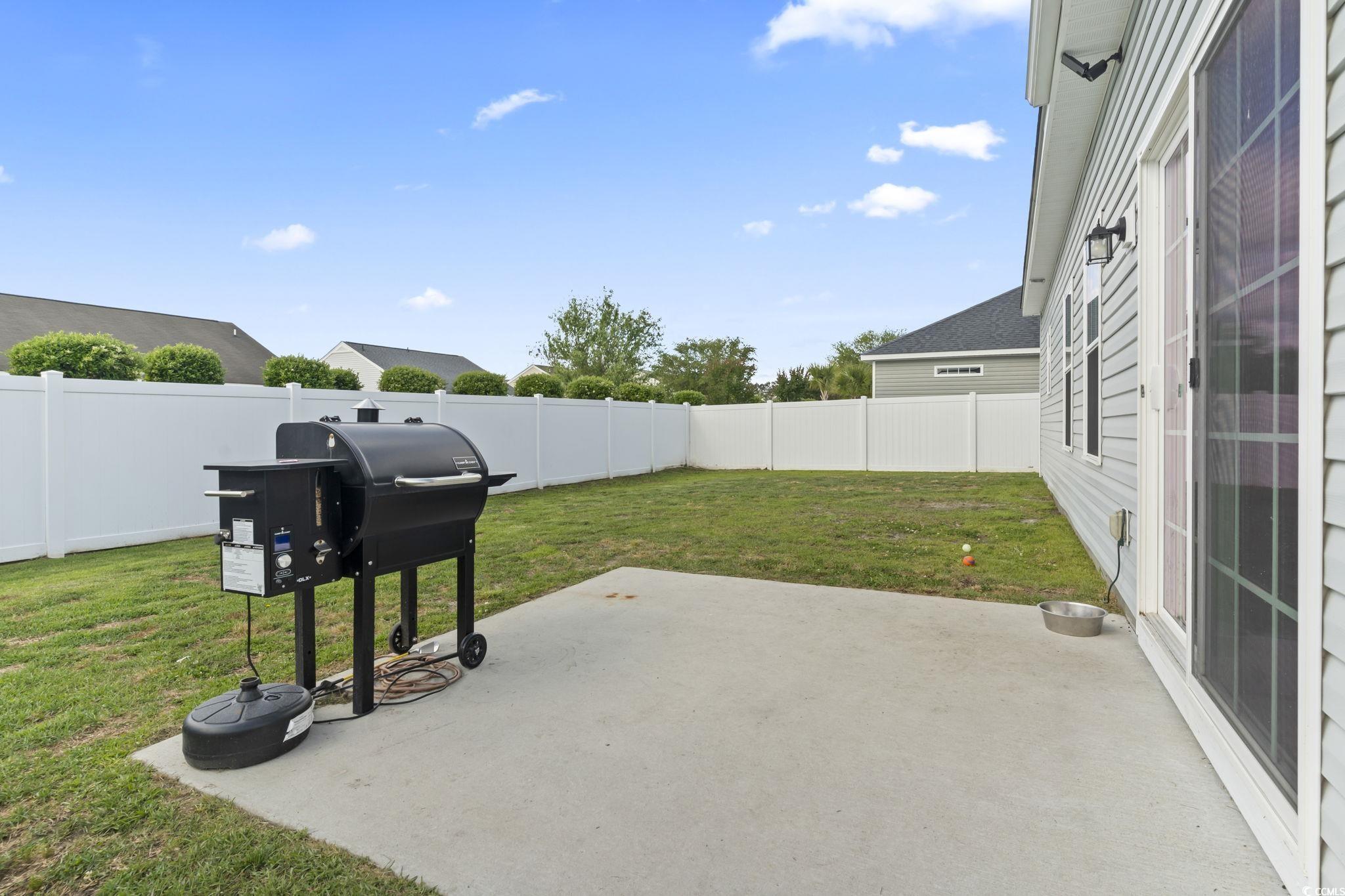 712 Hobonny Loop Longs, SC 29568 - Photo 33 of 39 View of patio / terrace featuring a fenced backyard and grilling area