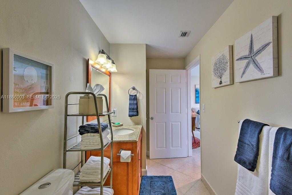2280 Southwest 32nd Avenue, Unit 509 Miami, FL 33145 - Photo 17 of 22 a view of a livingroom with furniture and wooden floor