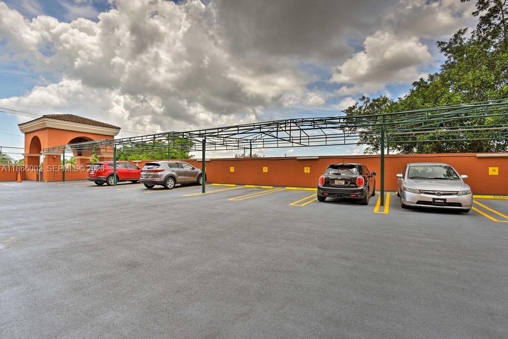 2280 Southwest 32nd Avenue, Unit 509 Miami, FL 33145 - Photo 22 of 22 a view of street with parked cars