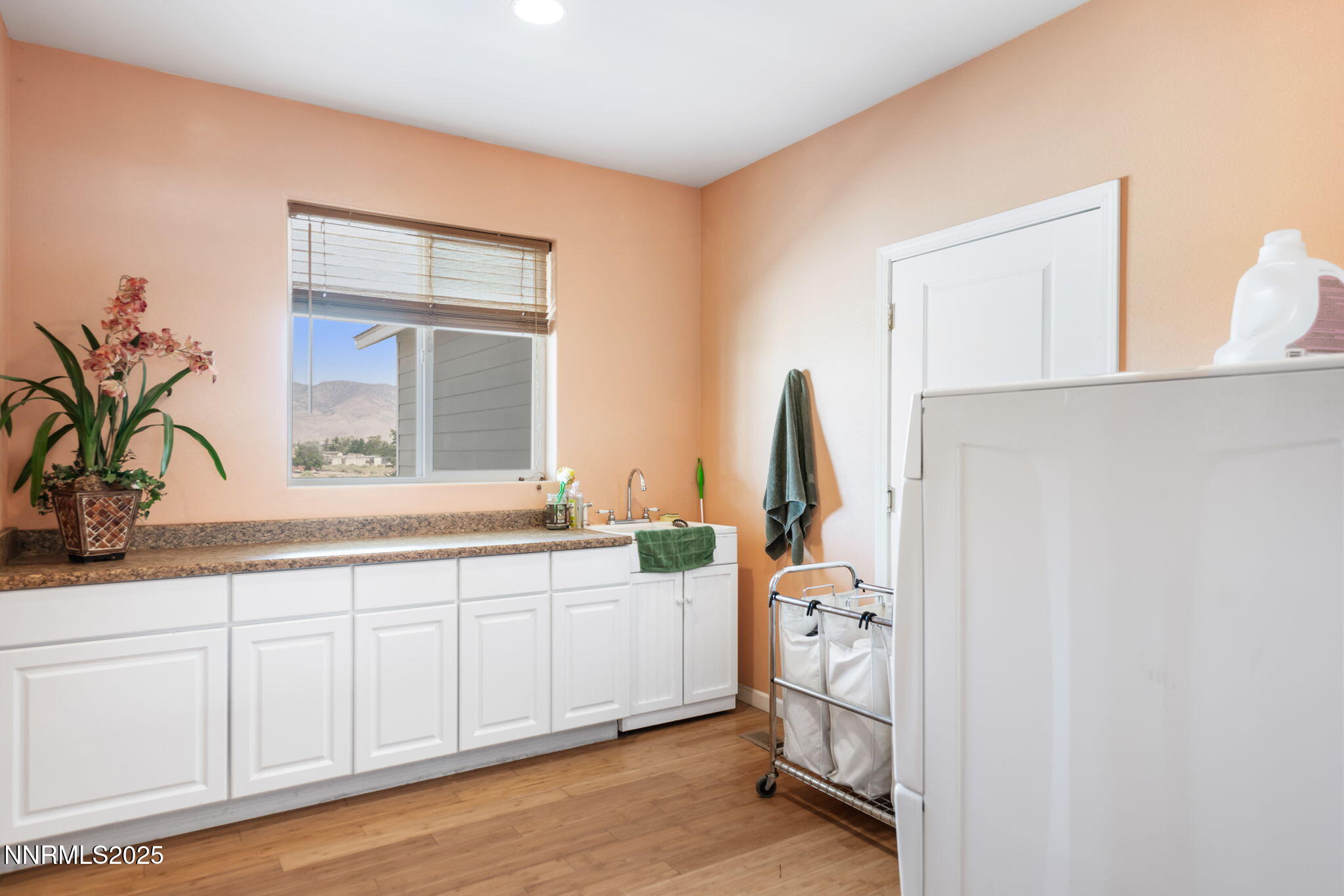 275 Imperial Road Dayton, NV 89403 - Photo 19 of 53 a bathroom with a double vanity sink and a mirror