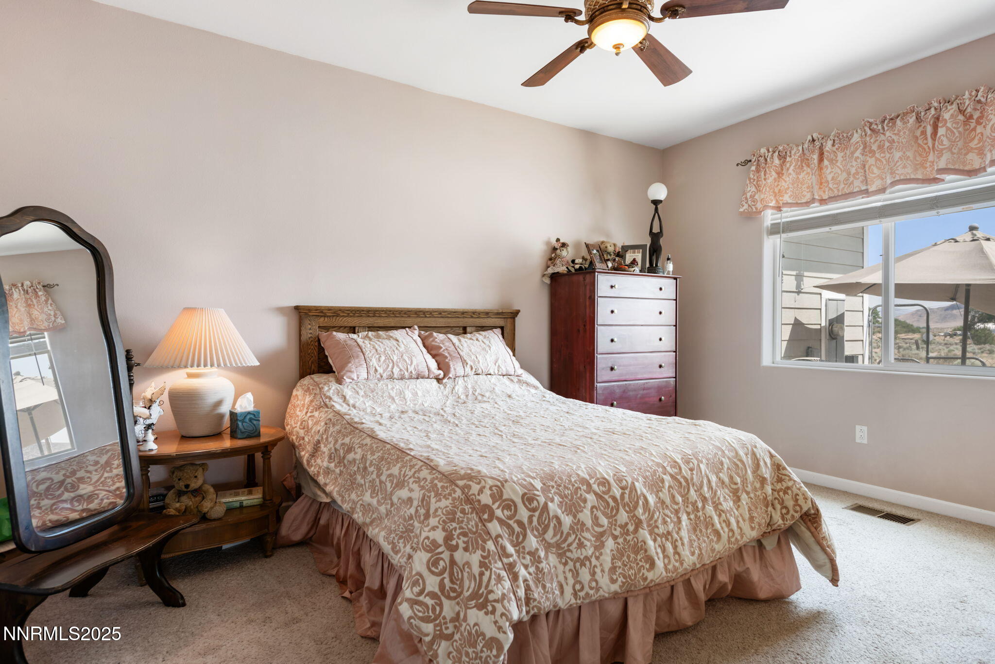 275 Imperial Road Dayton, NV 89403 - Photo 21 of 53 a bedroom with a bed and dresser