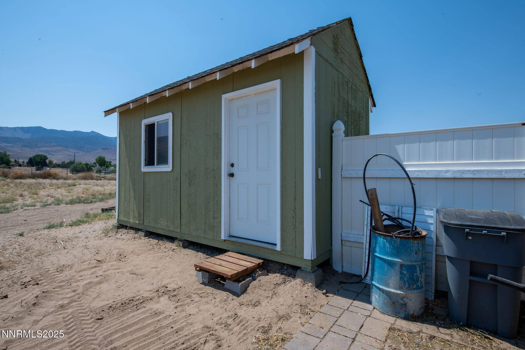 275 Imperial Road Dayton, NV 89403 - Photo 30 of 53 a backyard of a house