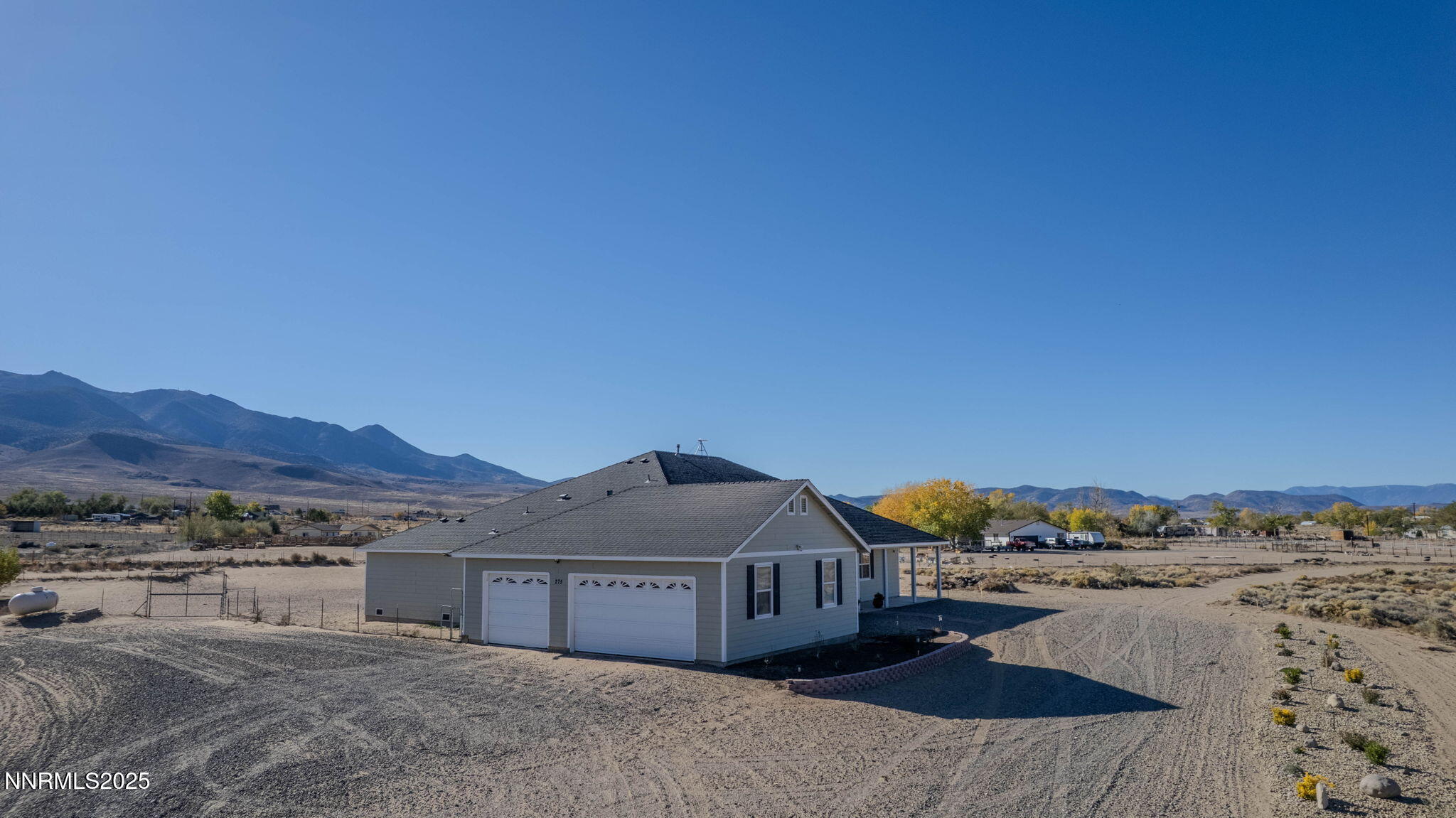 275 Imperial Road Dayton, NV 89403 - Photo 38 of 53 a view of a house with a yard and mountain view