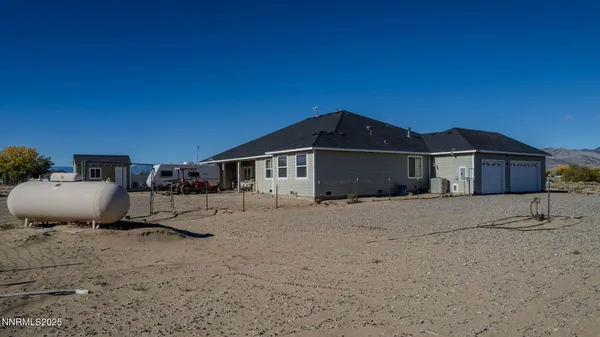 a view of a house with a ocean beach